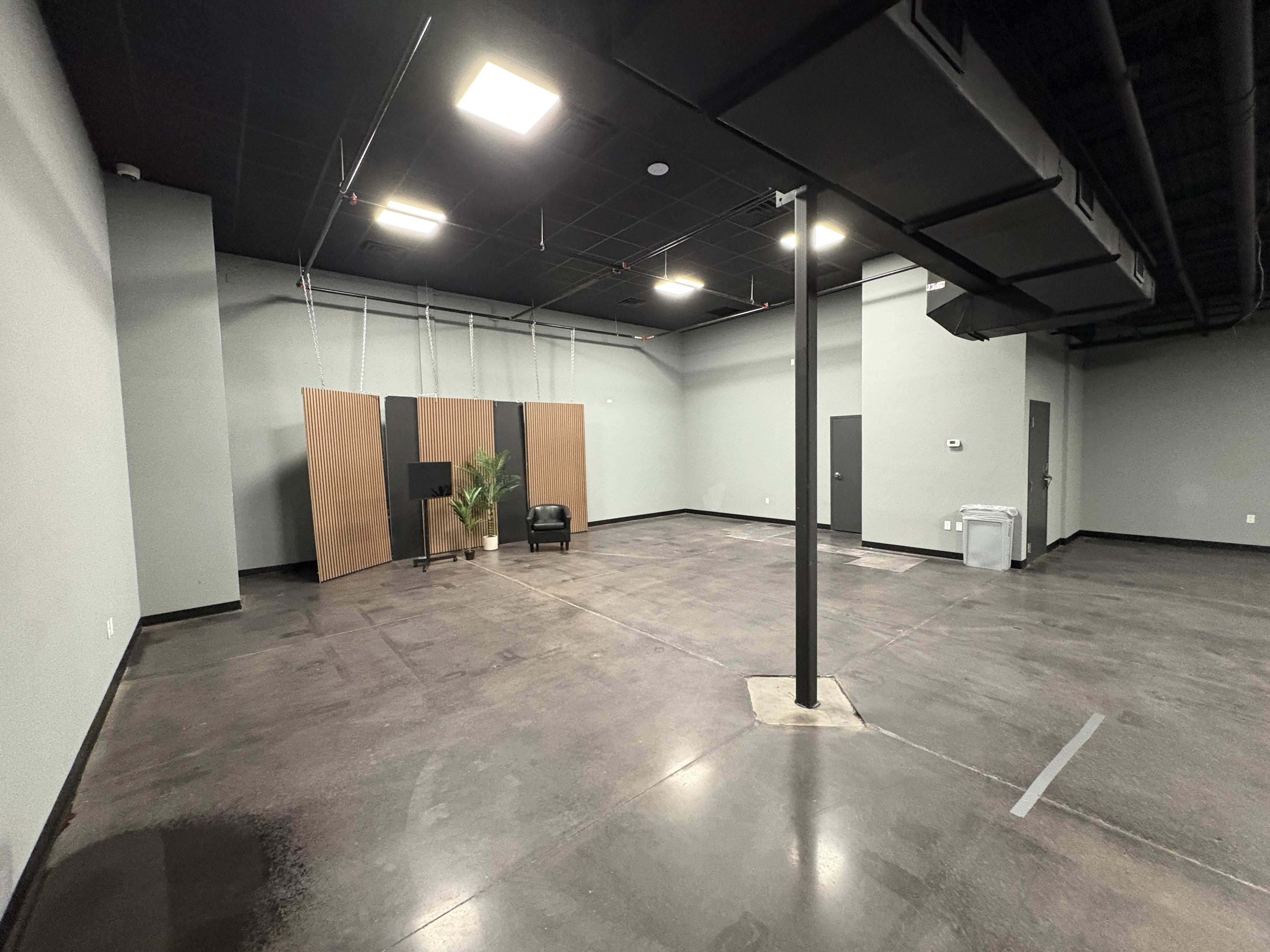 Sleek, Modern Creative Studio with Reception, Lounge & Warehouse Space — Perfect for Photo, Video, Events -  7 minutes from MCO Image in Airport North, Orlando, FL