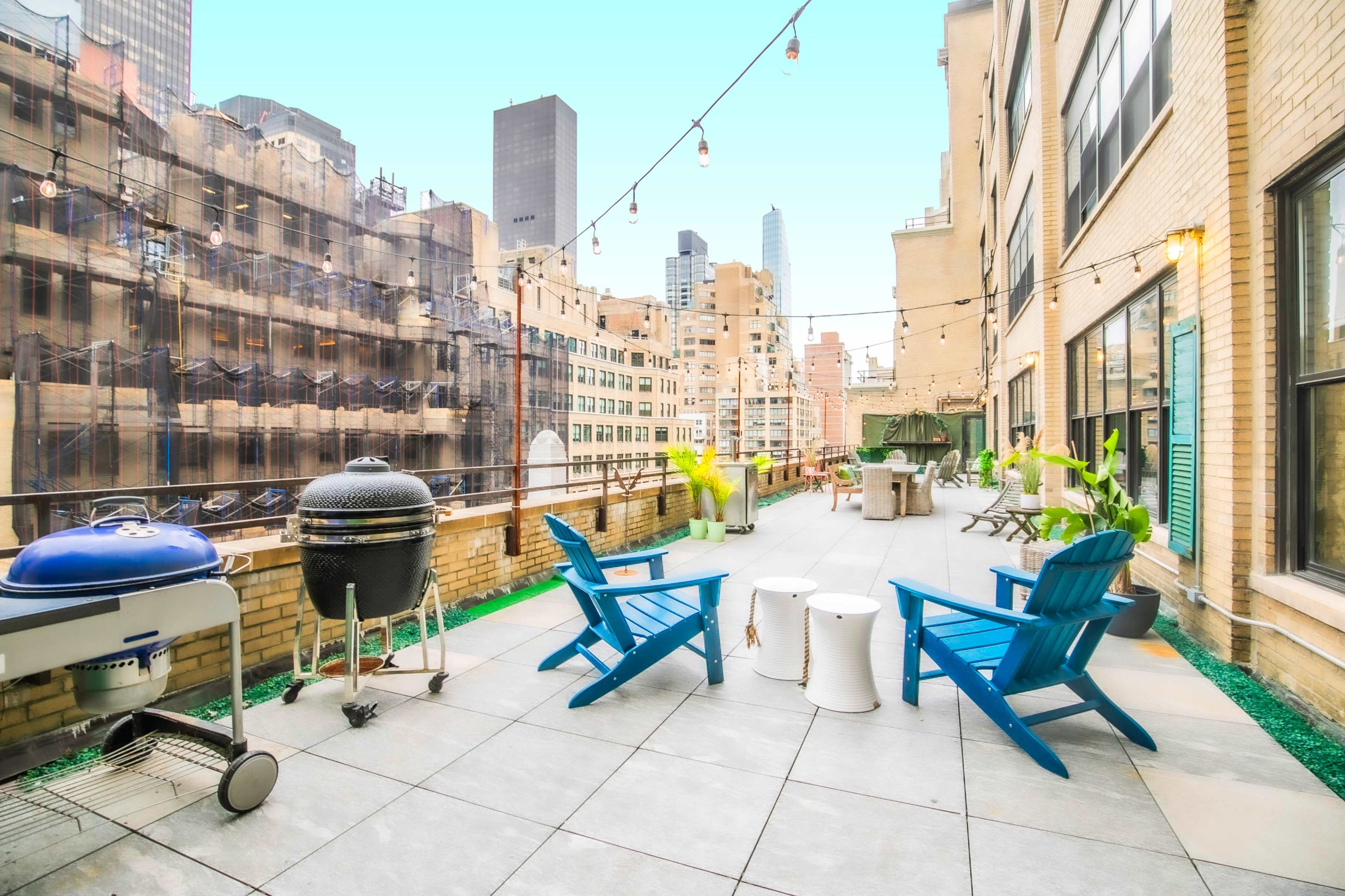 Professional Event Space *Private Outdoor Rooftop + Bar + Indoor lounge with Speak-Easy 'Living Room' Style + Chefs Kitchen Image in Midtown Manhattan, New York, NY