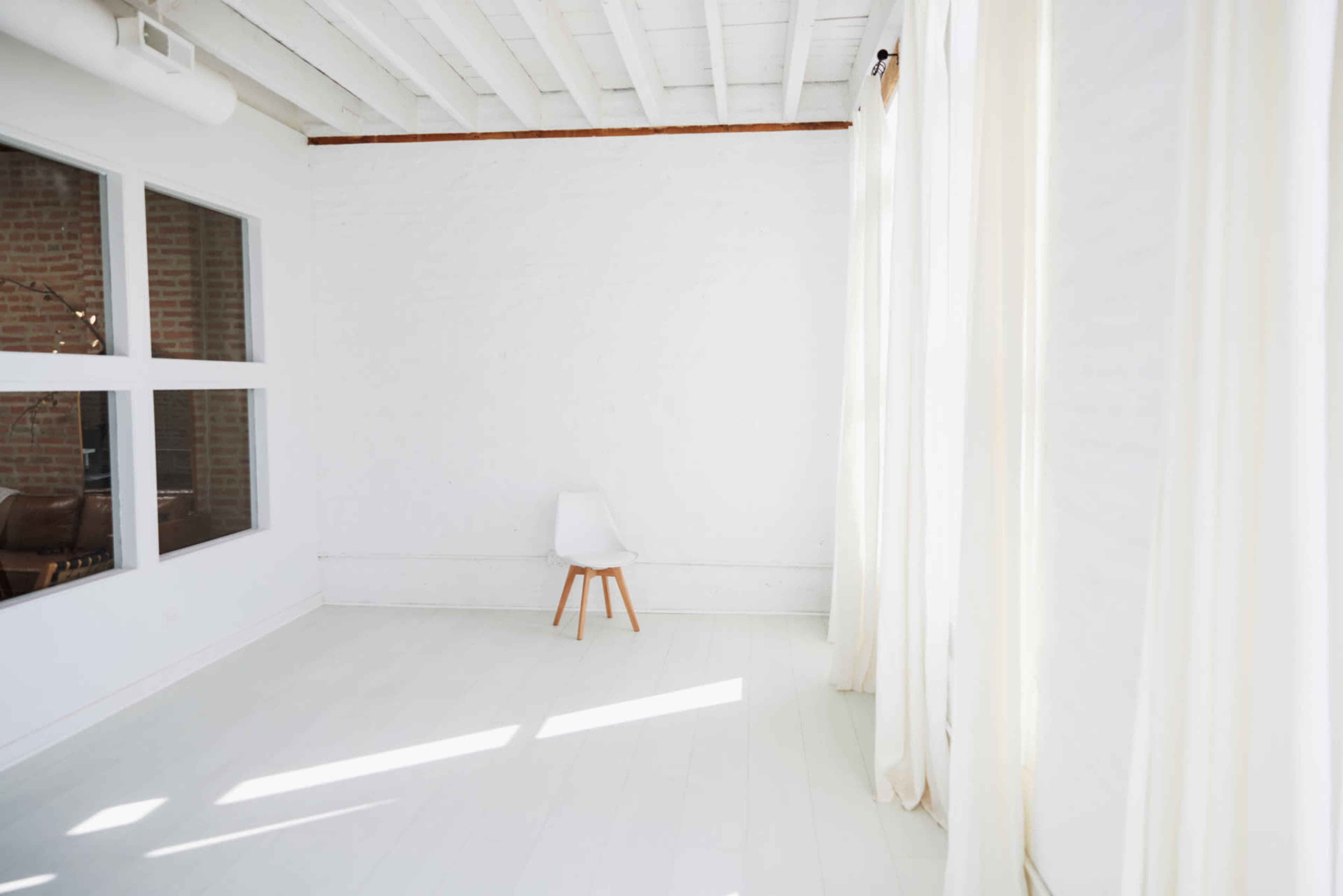 Enlightened Elegance: Discover an All White Light-Filled Studio in the Heart of Downtown Naperville Image in Downtown, Naperville, IL