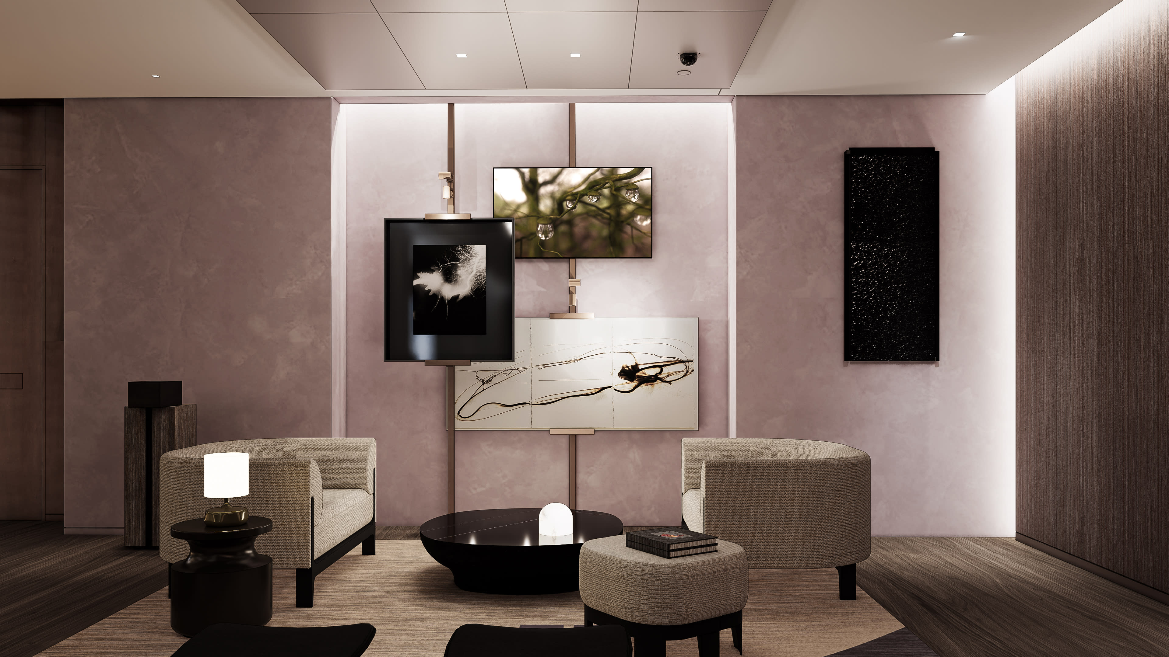 The scene features a modern lounge area with two upholstered chairs, a round coffee table, and a wall displaying multiple framed artworks and televisions.