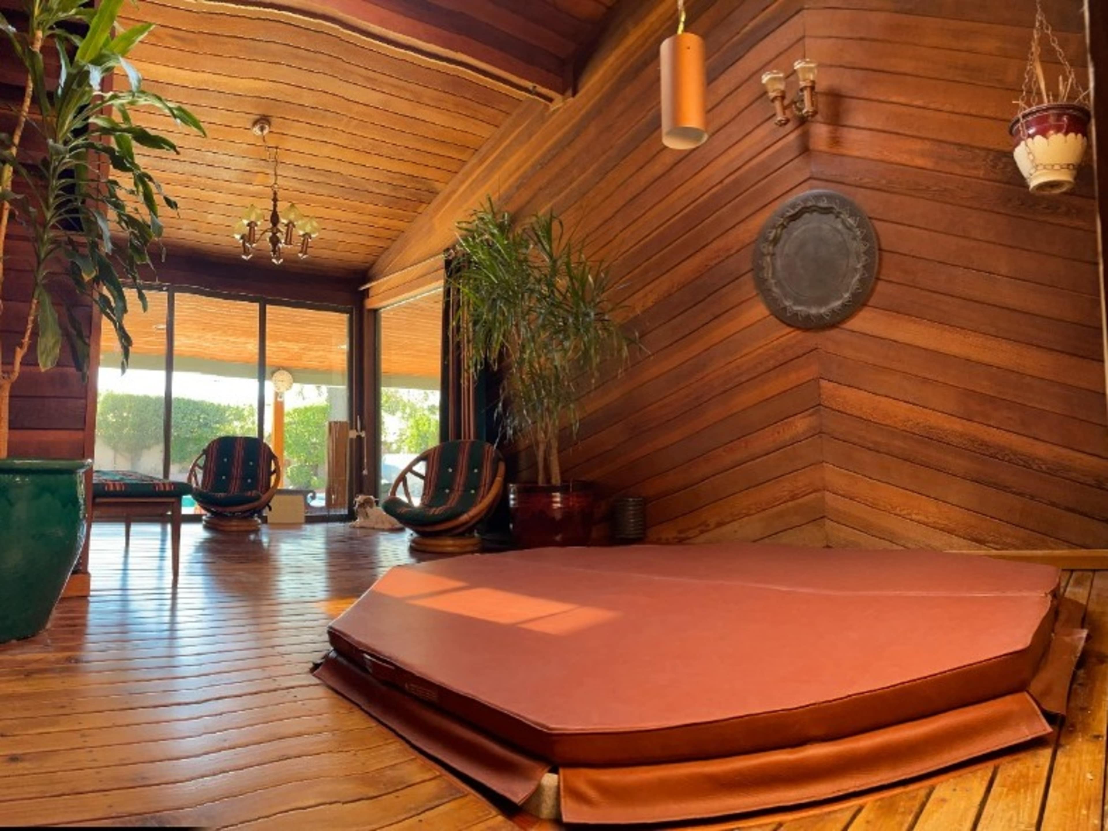 Redwood lined spa room with jacuzzi 