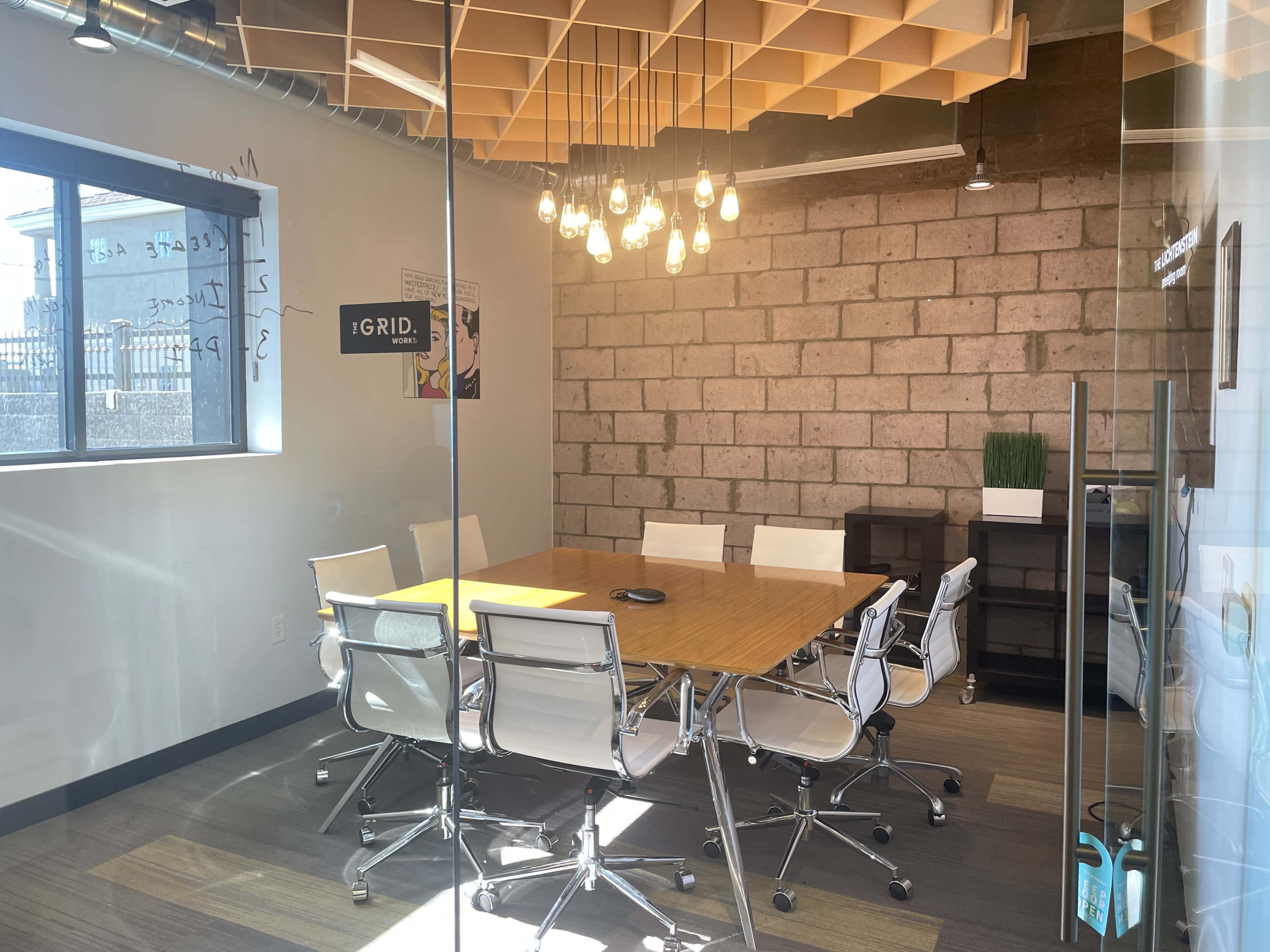 A Warm Industrial Modern Conference Room (great lighting/smart TV) WIFI Image in Camelback East Village, Phoenix, AZ