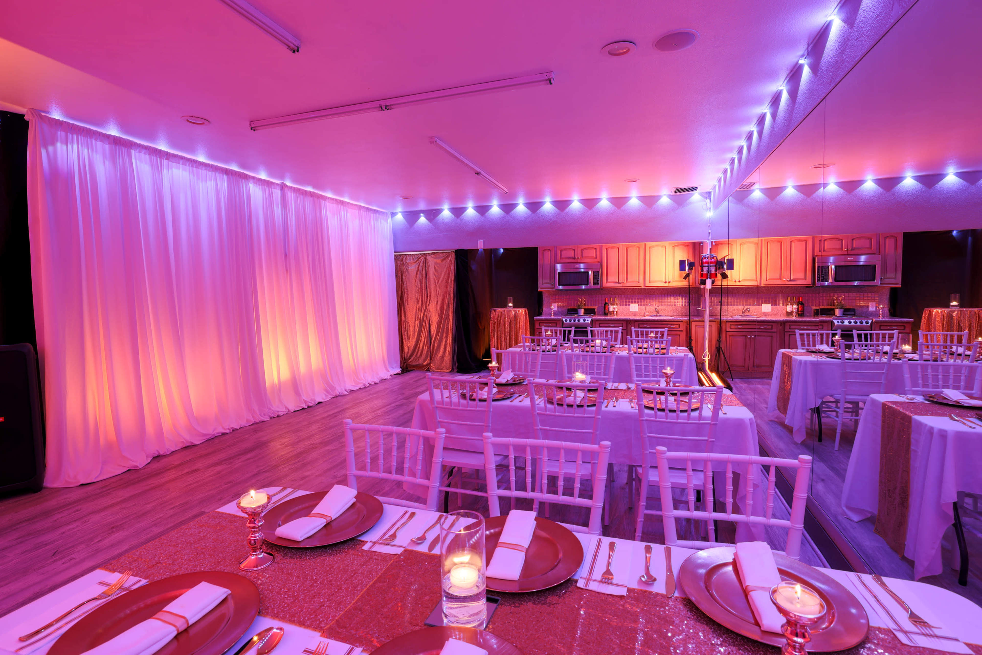 Intimate  Event Space with Custom Lighting Image in French Court, Santa Ana, CA