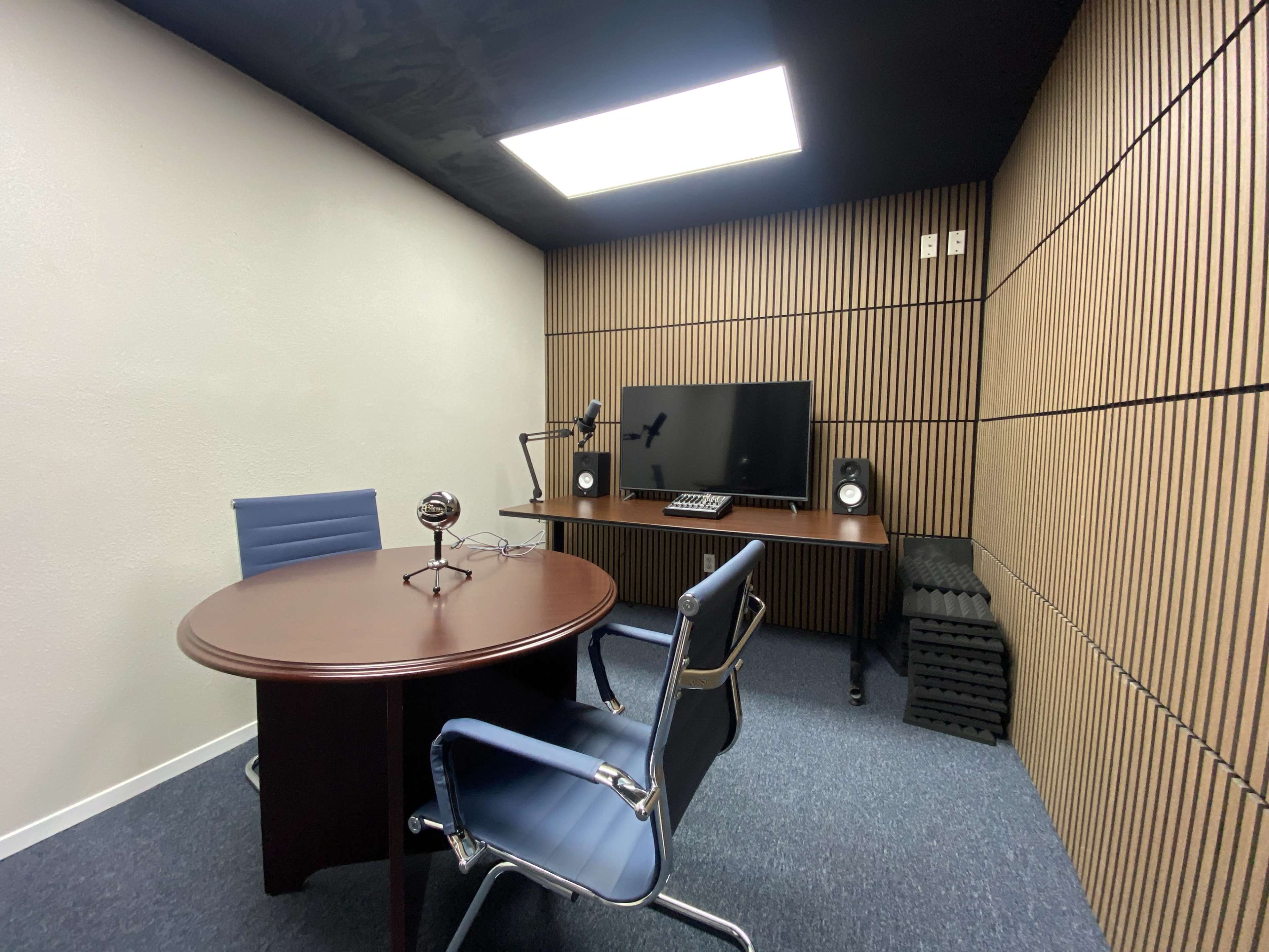 Podcast room equipped with mic and TV Image in Vance Jackson, San Antonio, TX