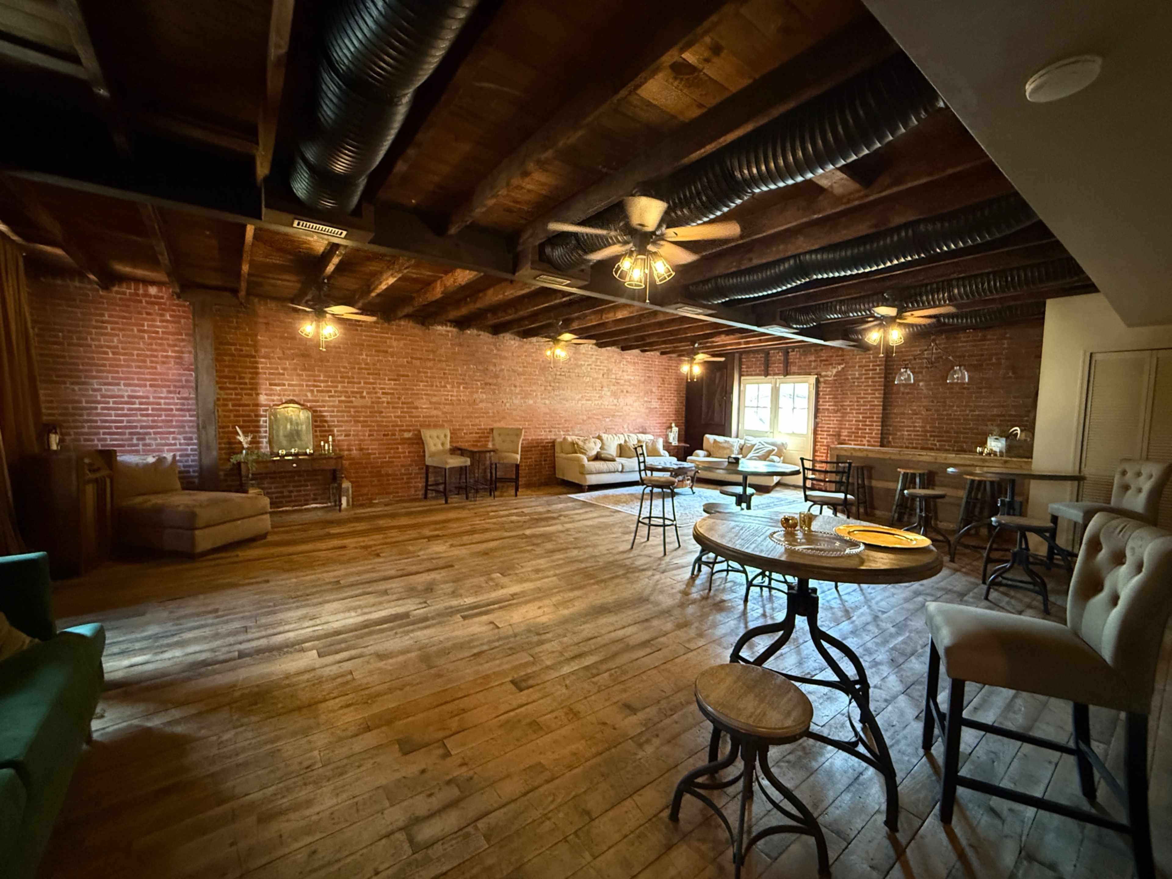 Charming two-level brick venue built in the early 1900s, blending timeless character with modern comfort Image in Old Town, Winchester, VA