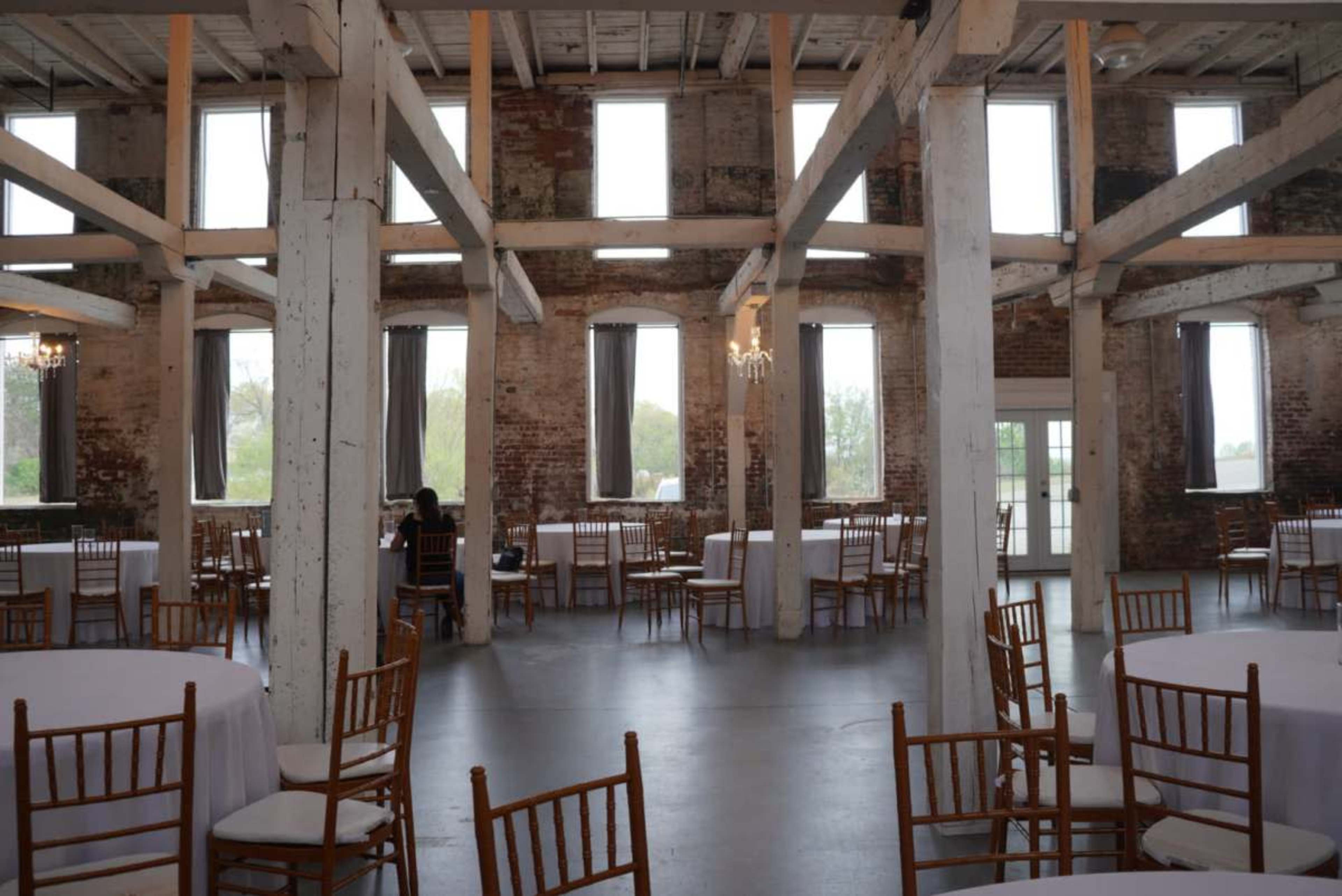 Historic Downtown Space with Exposed Brick and White Beams Image in Buford, Buford, GA