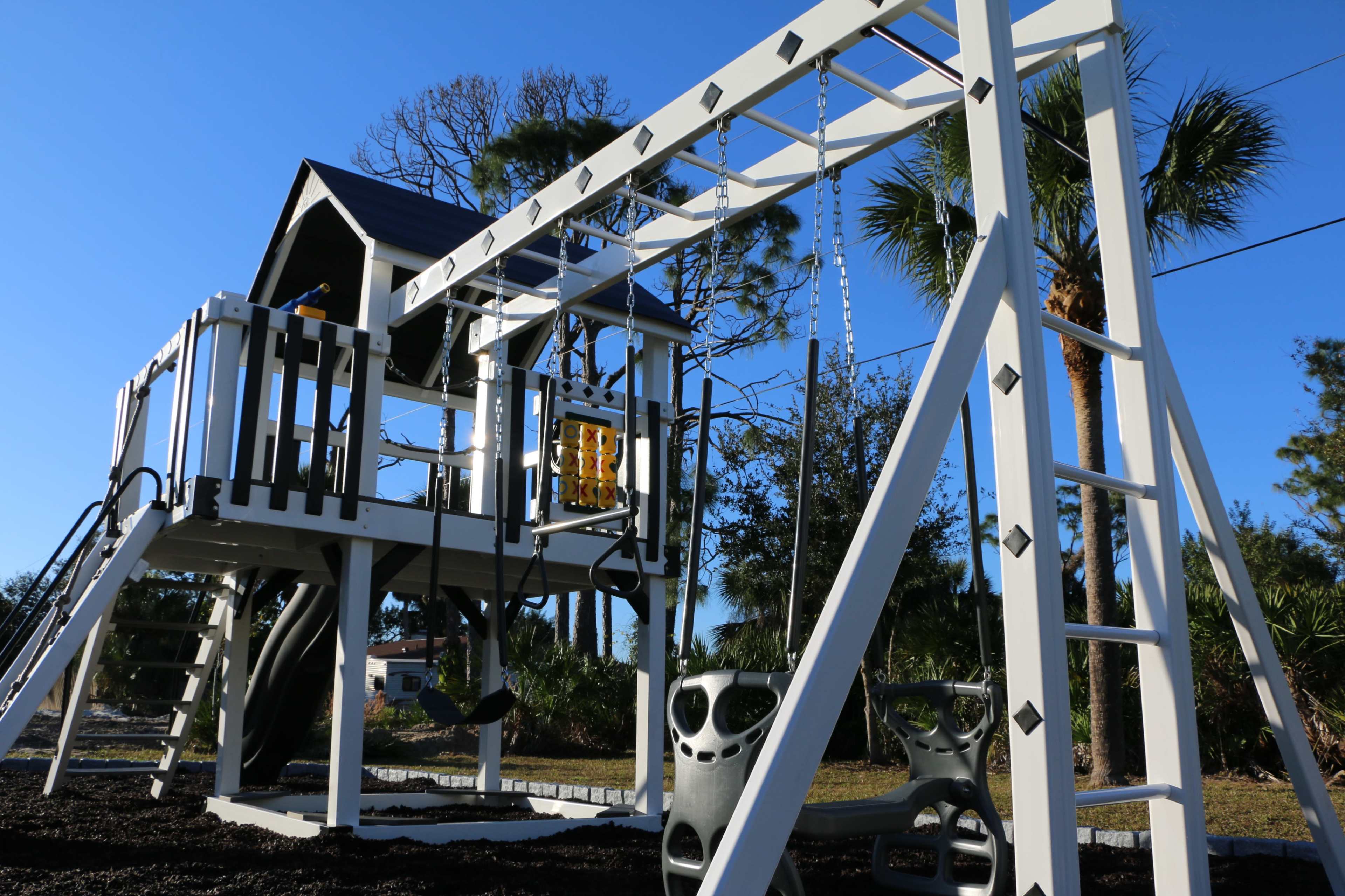 Quaint Florida casita on a double lot with a heated saltwater pool, massive playground, surrounded by Mother nature! Image in Englewood East, Port Charlotte, FL