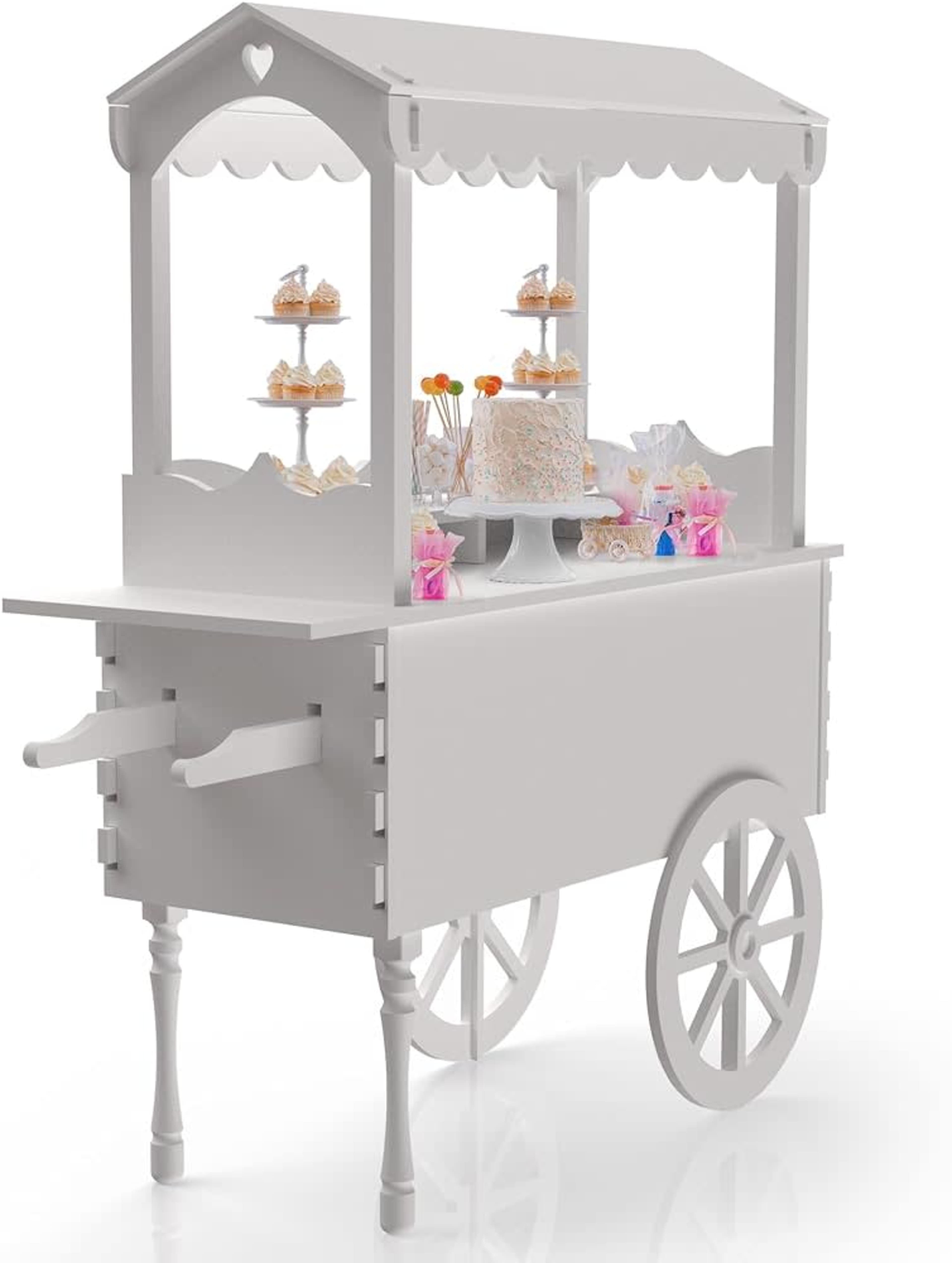 A white dessert cart with a canopy displays various sweets, including cupcakes and a multi-tiered cake, on glass shelves.