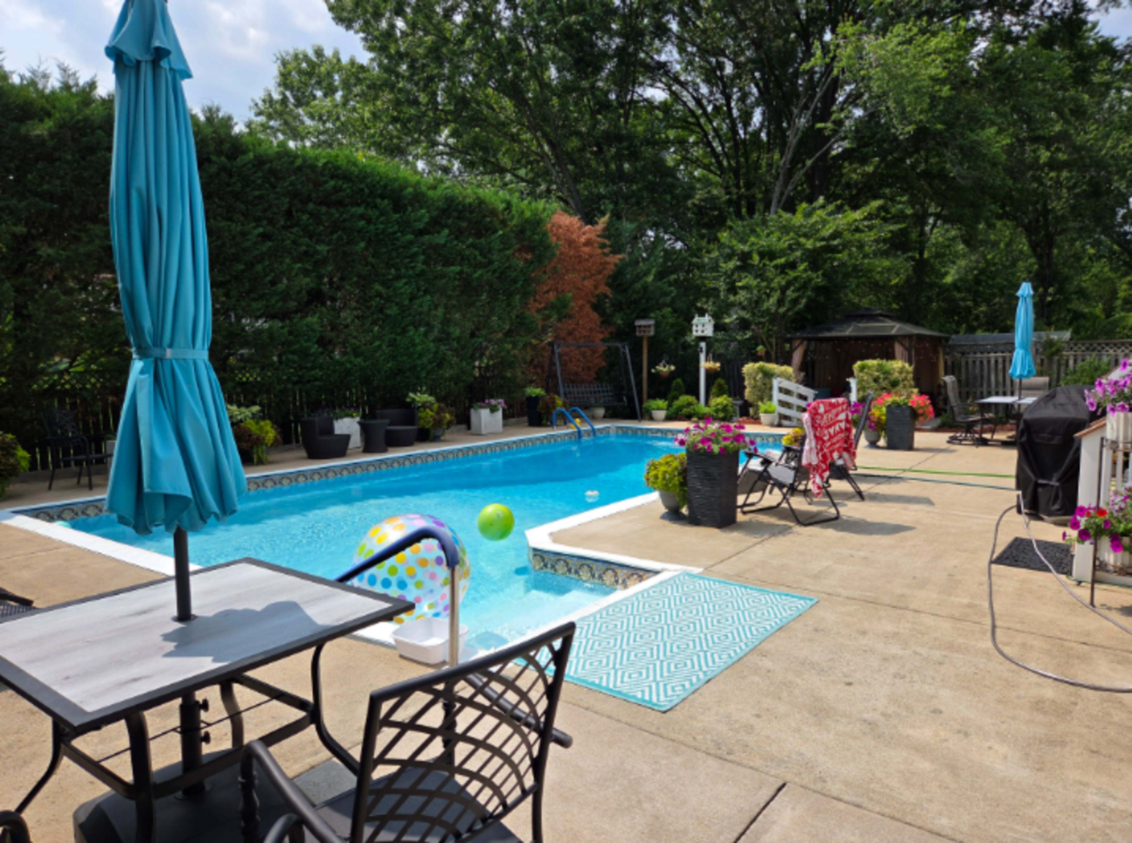Beautifully landscaped pool and back yard with gazebo Image in Woodlawn, ALEXANDRIA, VA