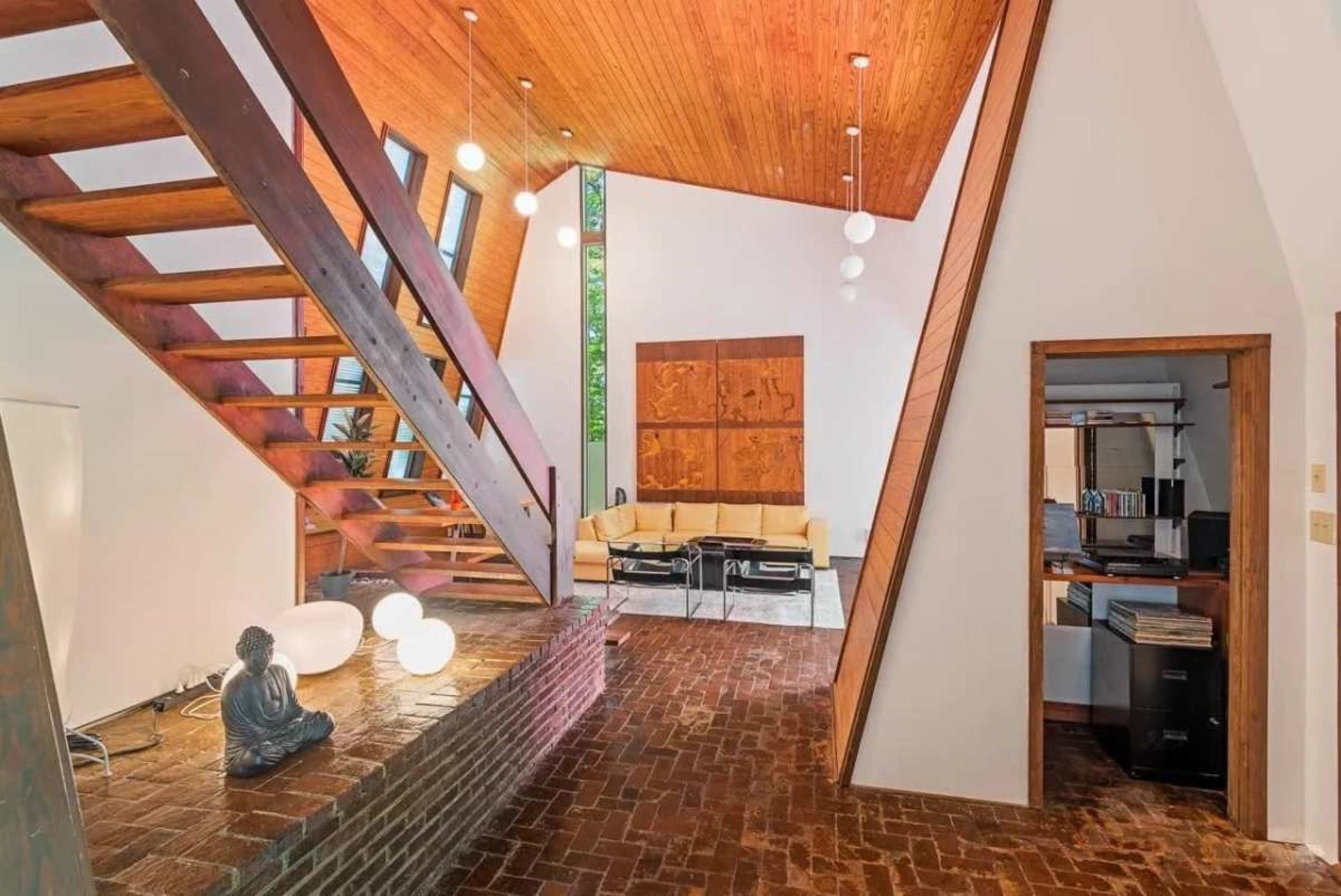Zen Midcentury Gem with Soaring Ceilings in a Forest Setting Image in Duke Forest, Durham, NC