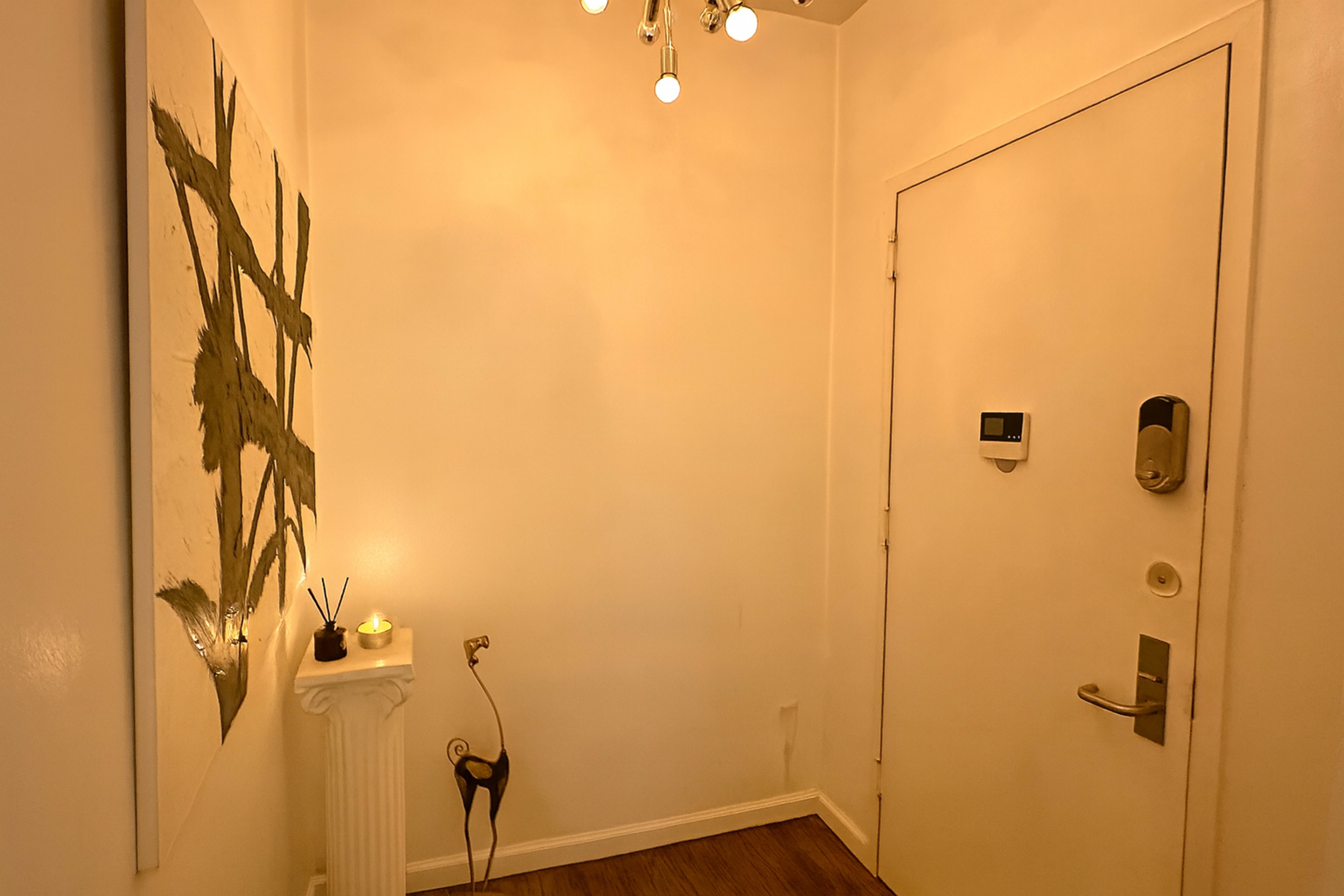 Modern Harlem Hideaway Apartment with Warm Lighting and Artistic Touches Image in West Harlem, New York, NY