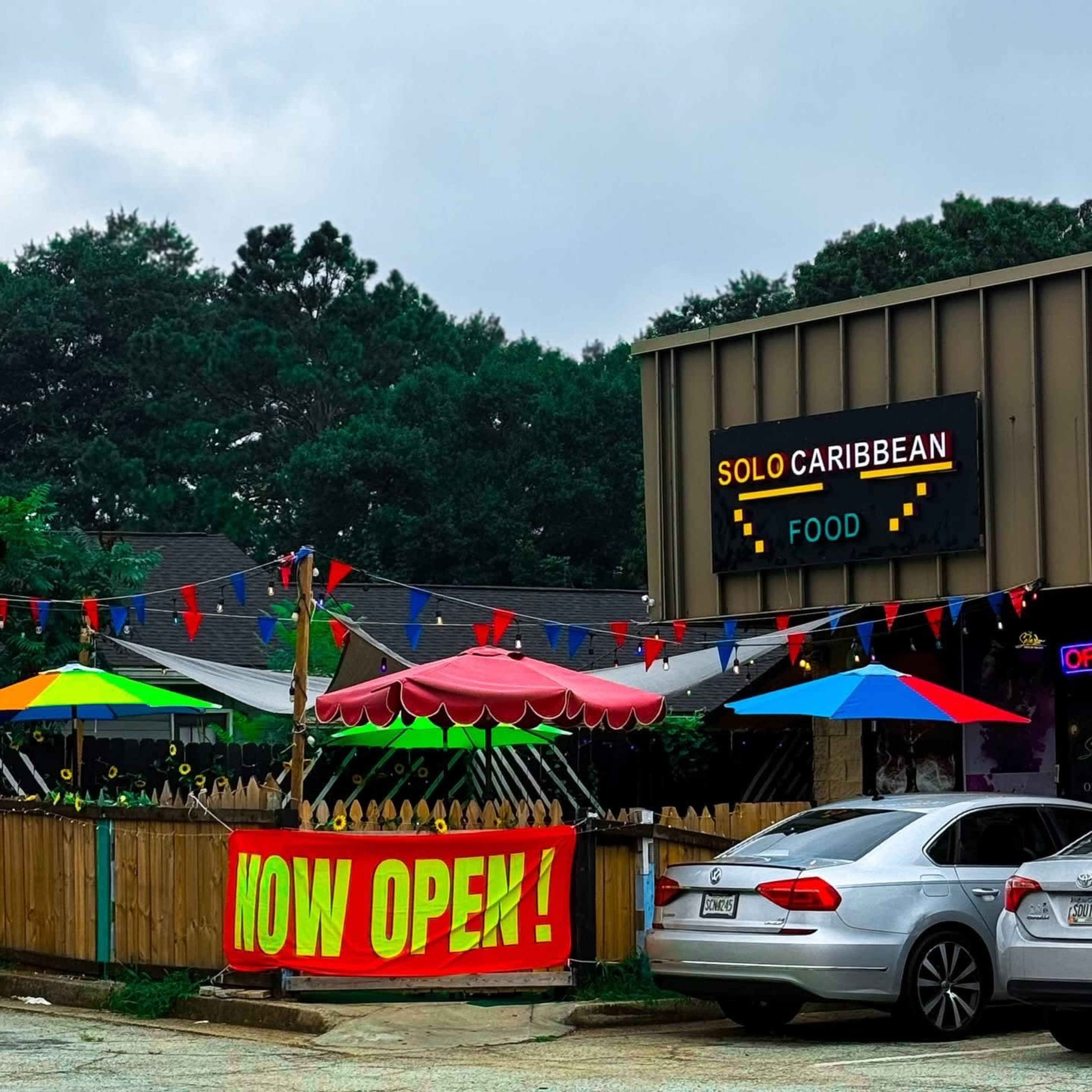 Festive Caribbean-Inspired Restaurant with Cozy Indoor Lounge & Colorful Patio. Image in Carrollton, carrollton, GA