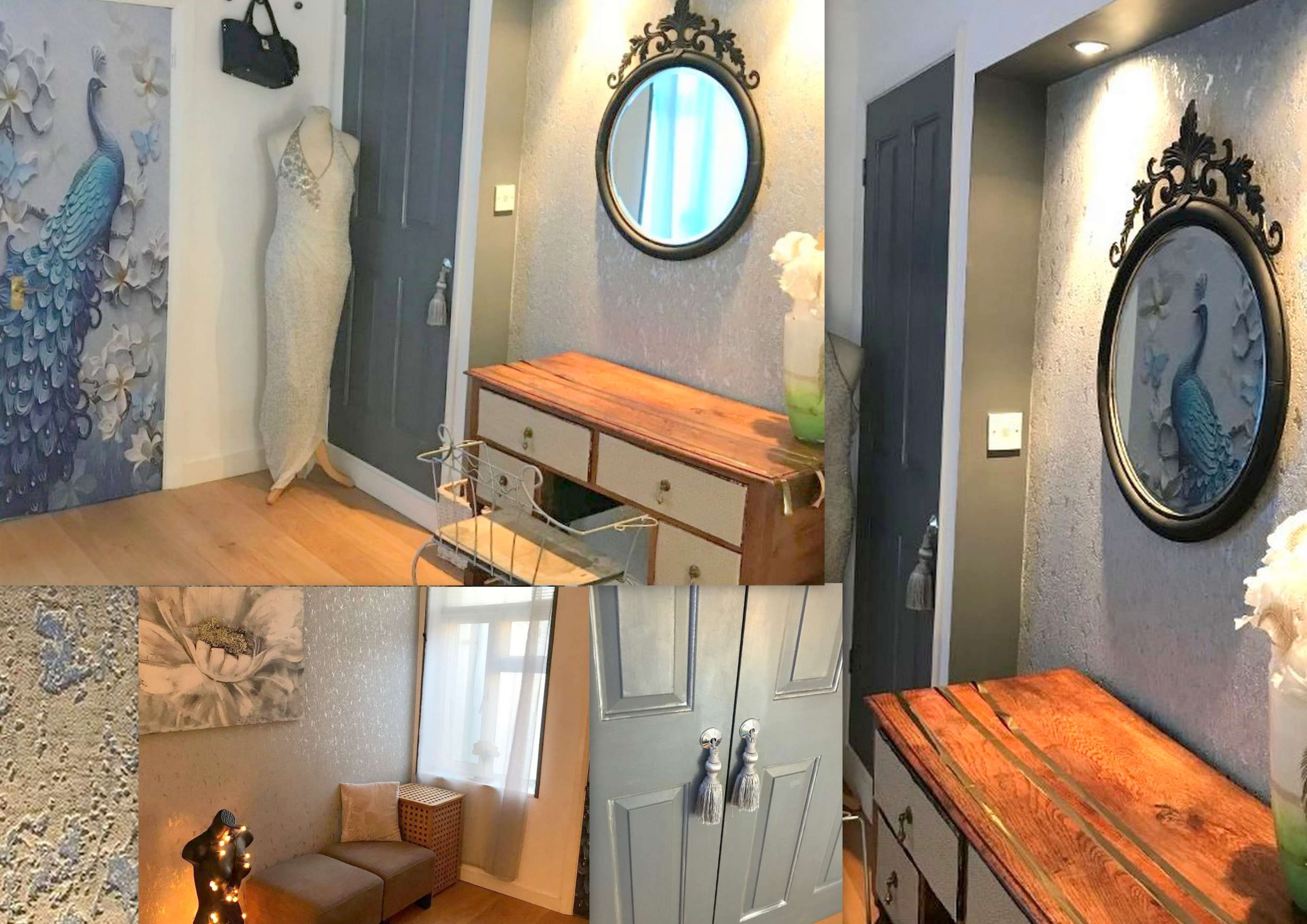 A well-decorated interior space featuring a wooden console table, a large mirror, a decorative wall art piece, and a mannequin, all set against muted walls and stylish furnishings.