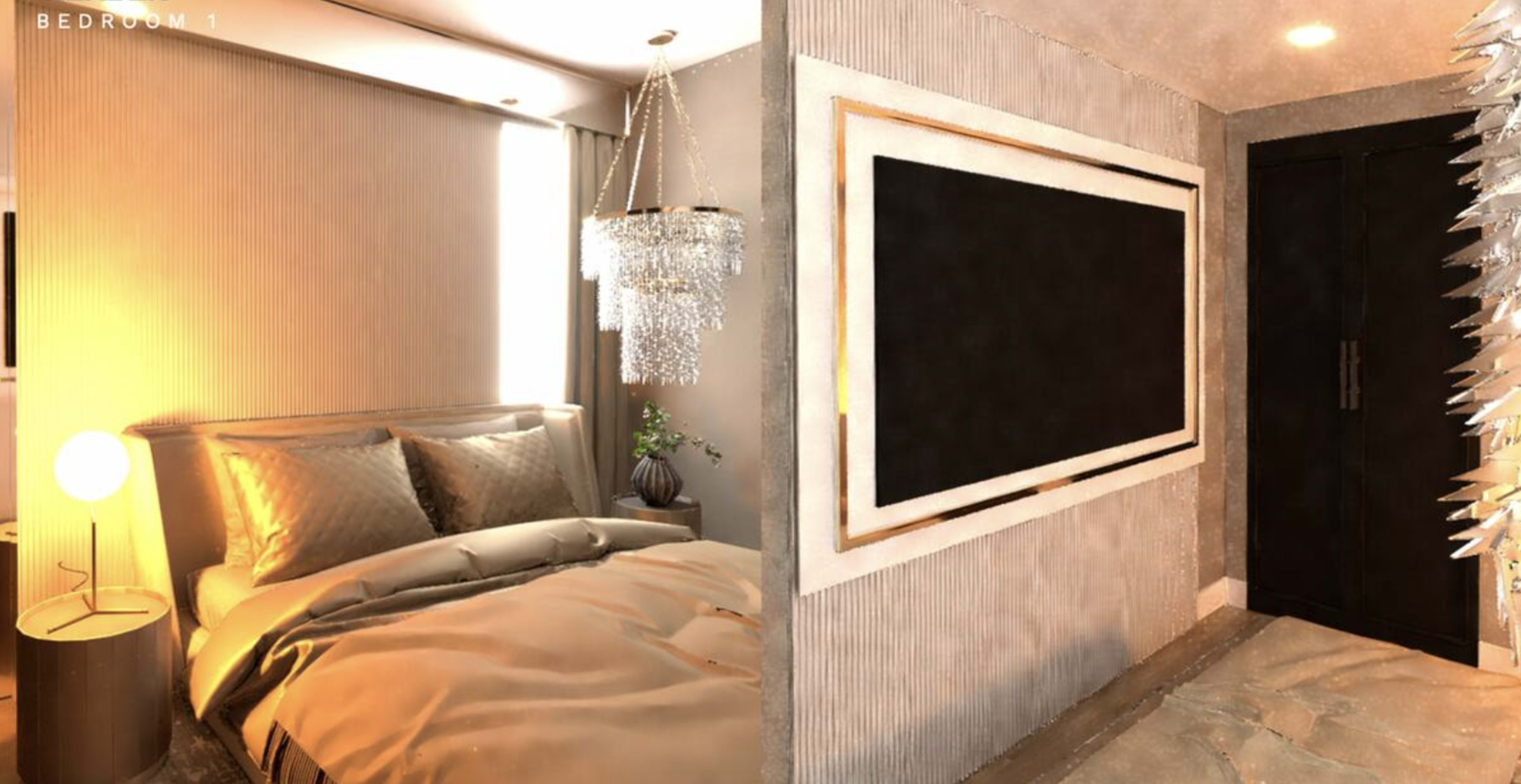 The image shows a modern bedroom with a large bed, a chandelier hanging overhead, and a black panel on the wall next to a dark door.