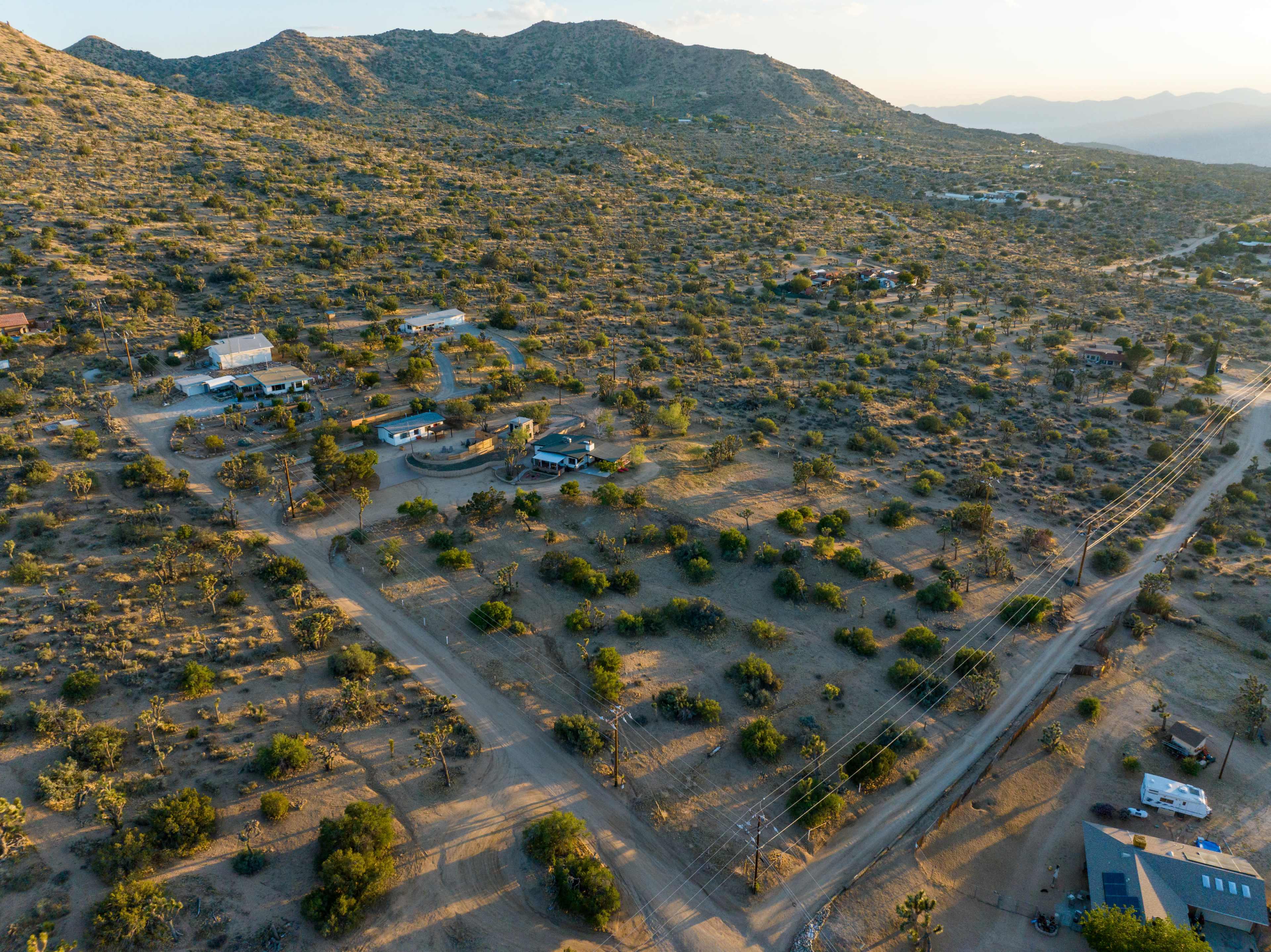 Secluded house, casita and rock tower on 3.5 acres of beautiful hillside desert land with joshua trees Image in Yucca Valley, Yucca Valley, CA