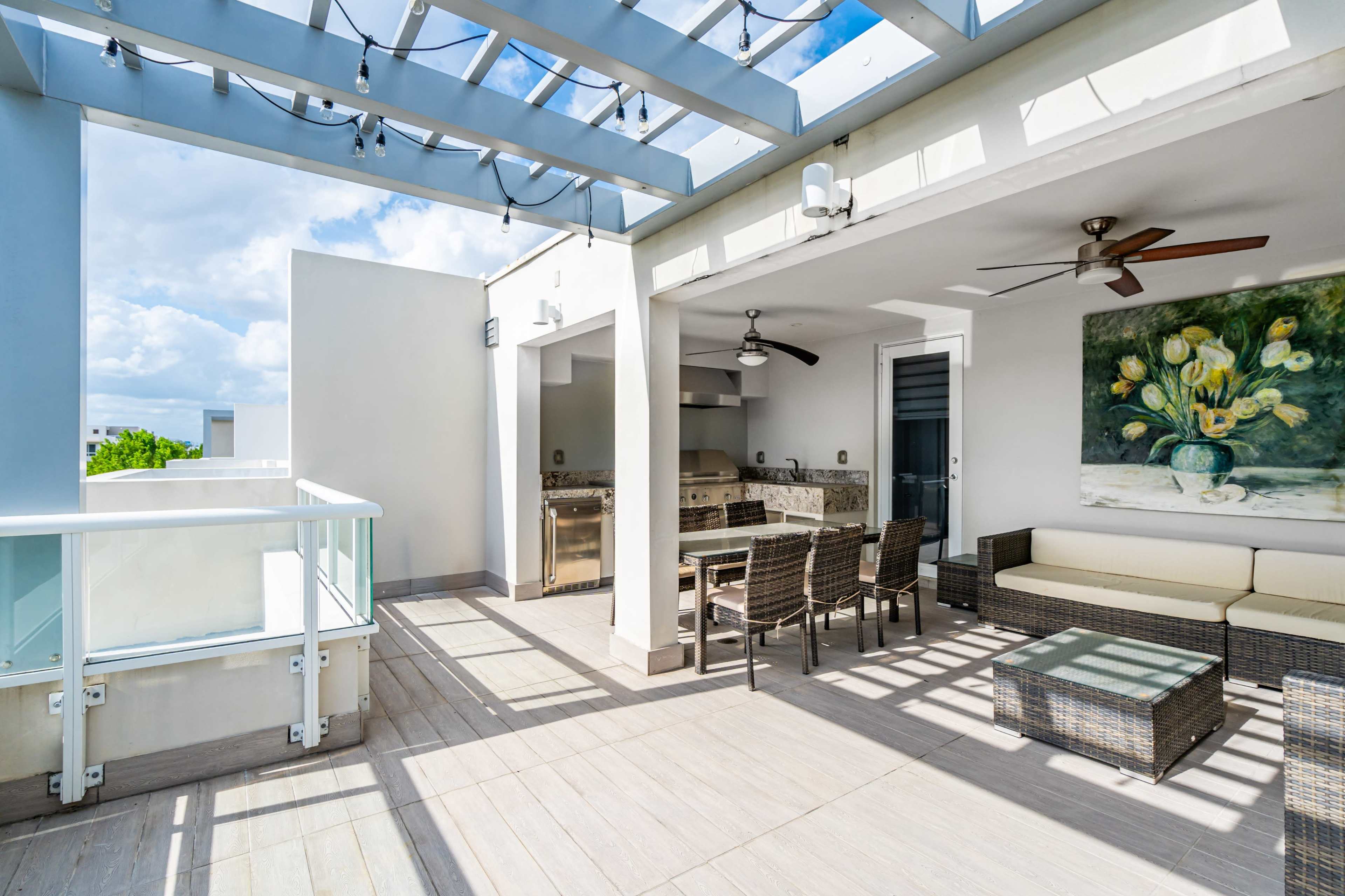 Sky-view Terrace with summer kitchen and mini fridge, four patios in different environments Image in Doral, Doral, FL
