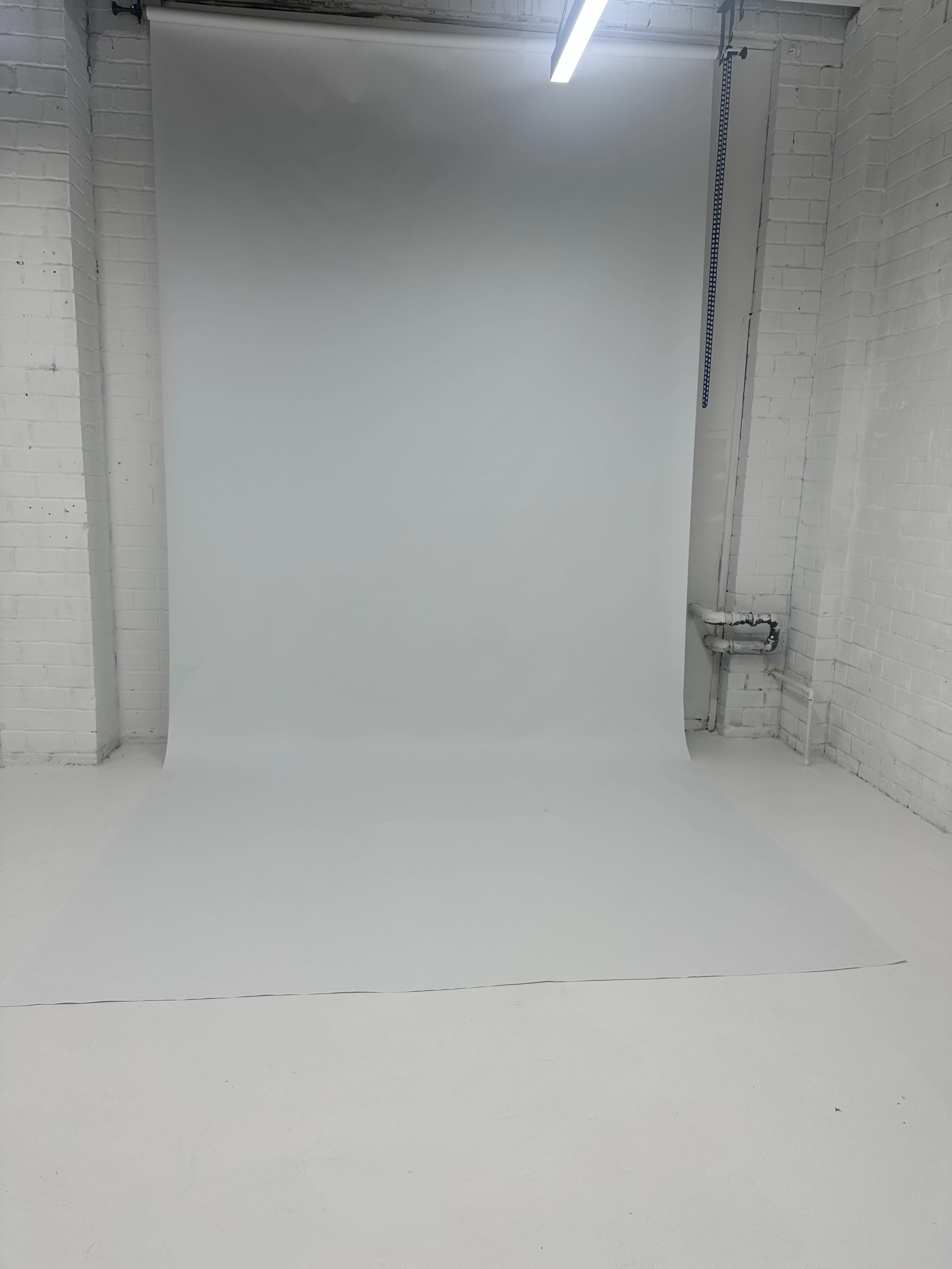All White Photography Studio w/ 12 ft Ceilings in Maplewood Image in Hadley Township, St. Louis, MO