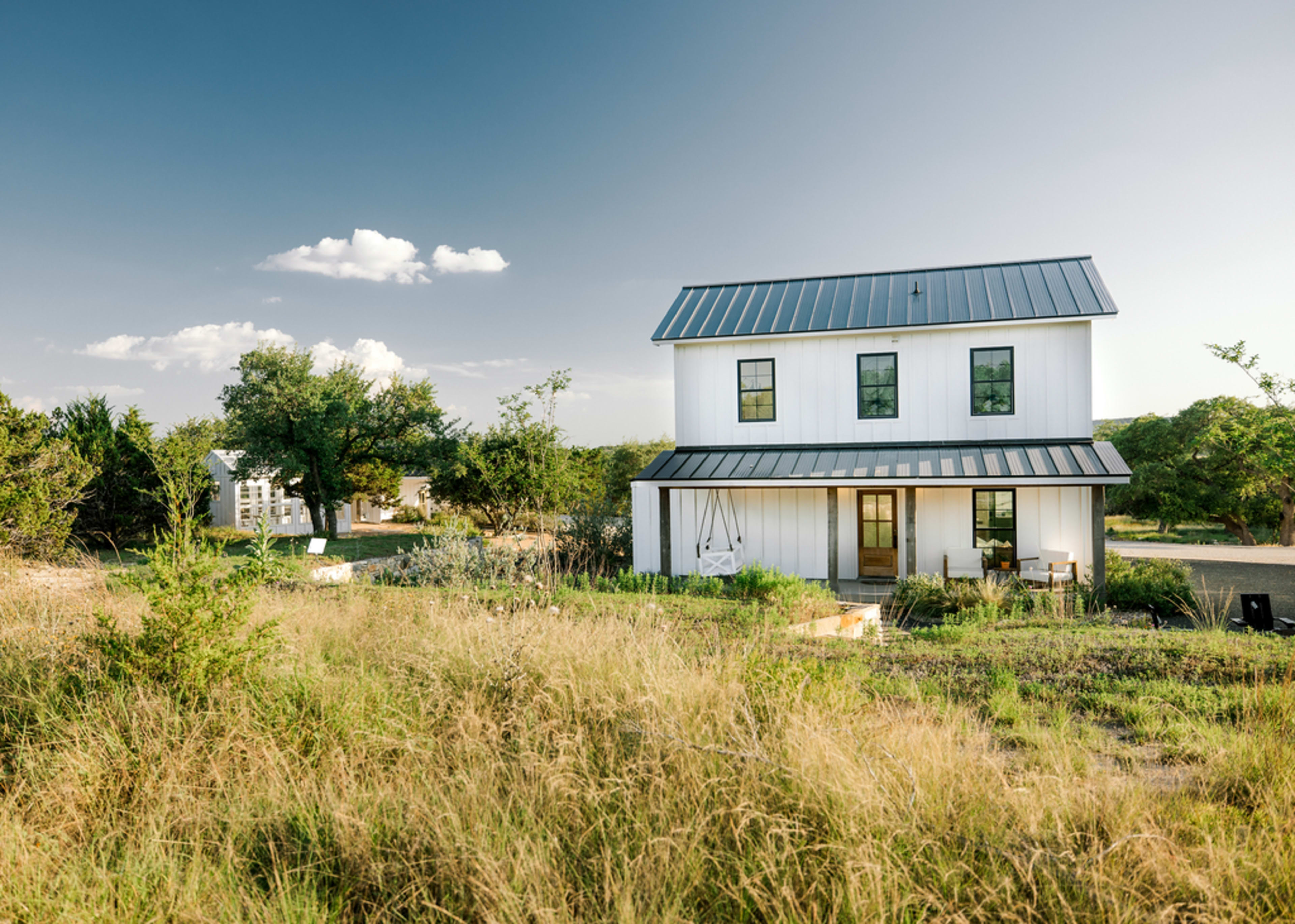 White Natural Lightfilled Farmhouse and Greenhouse Image in , Kendalia, TX