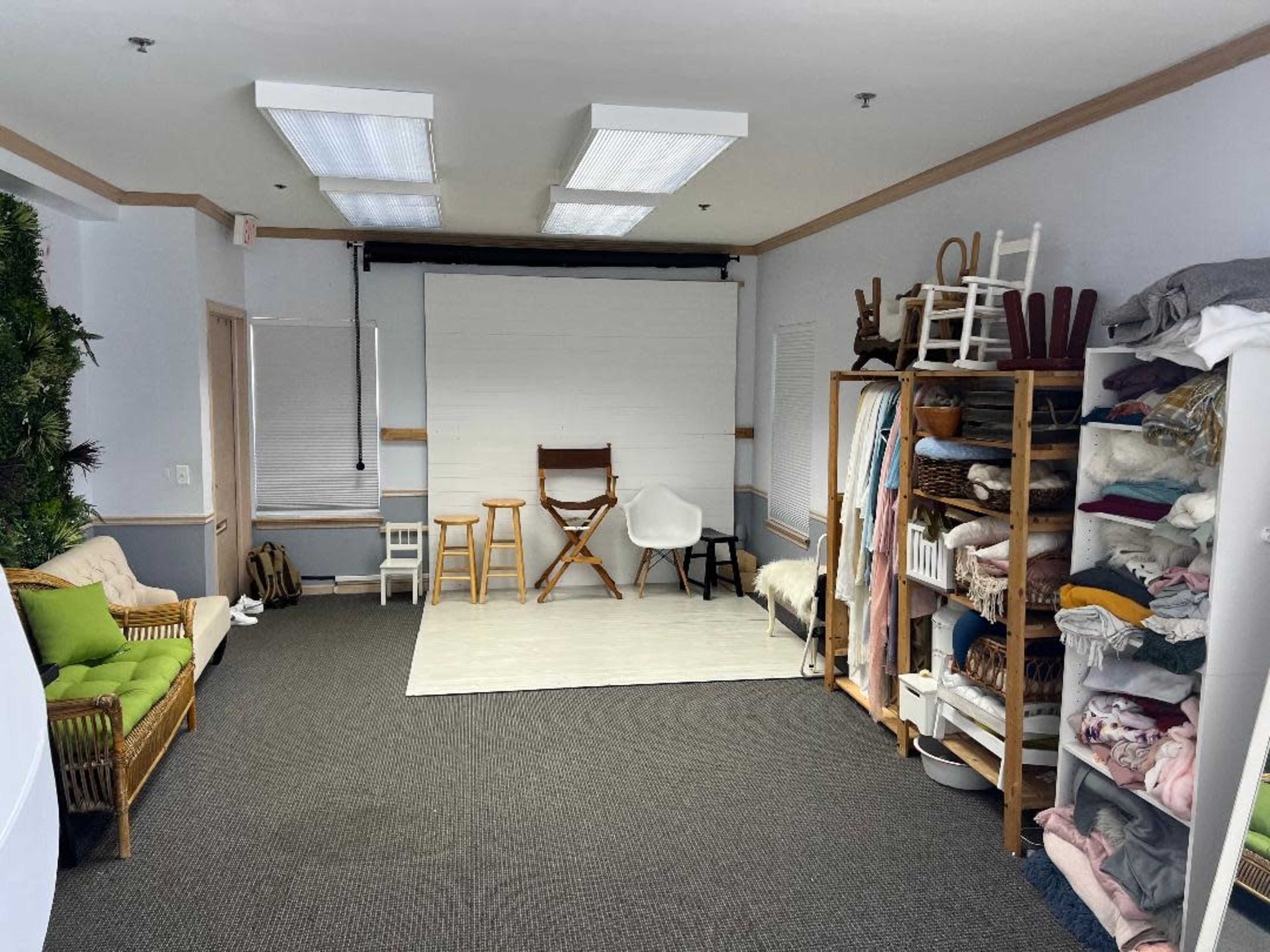 Photography Studio with boho room, seamless paper backdrops, and LED window walls. Image in Winfield Township, Winfield, IL