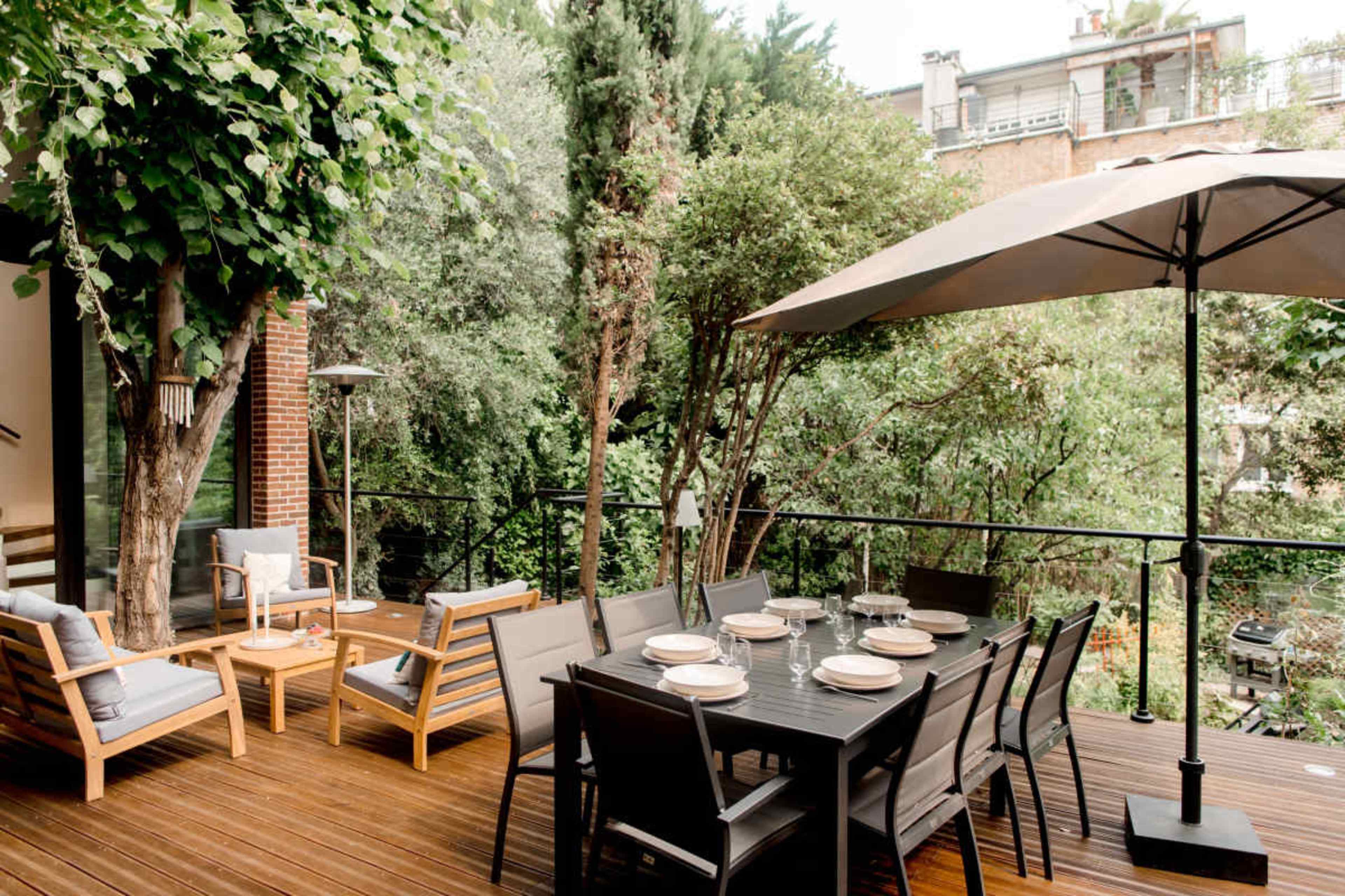 Maison familiale spacieuse climatisée avec terrasse & jardin, proche La Défense Image in , Puteaux