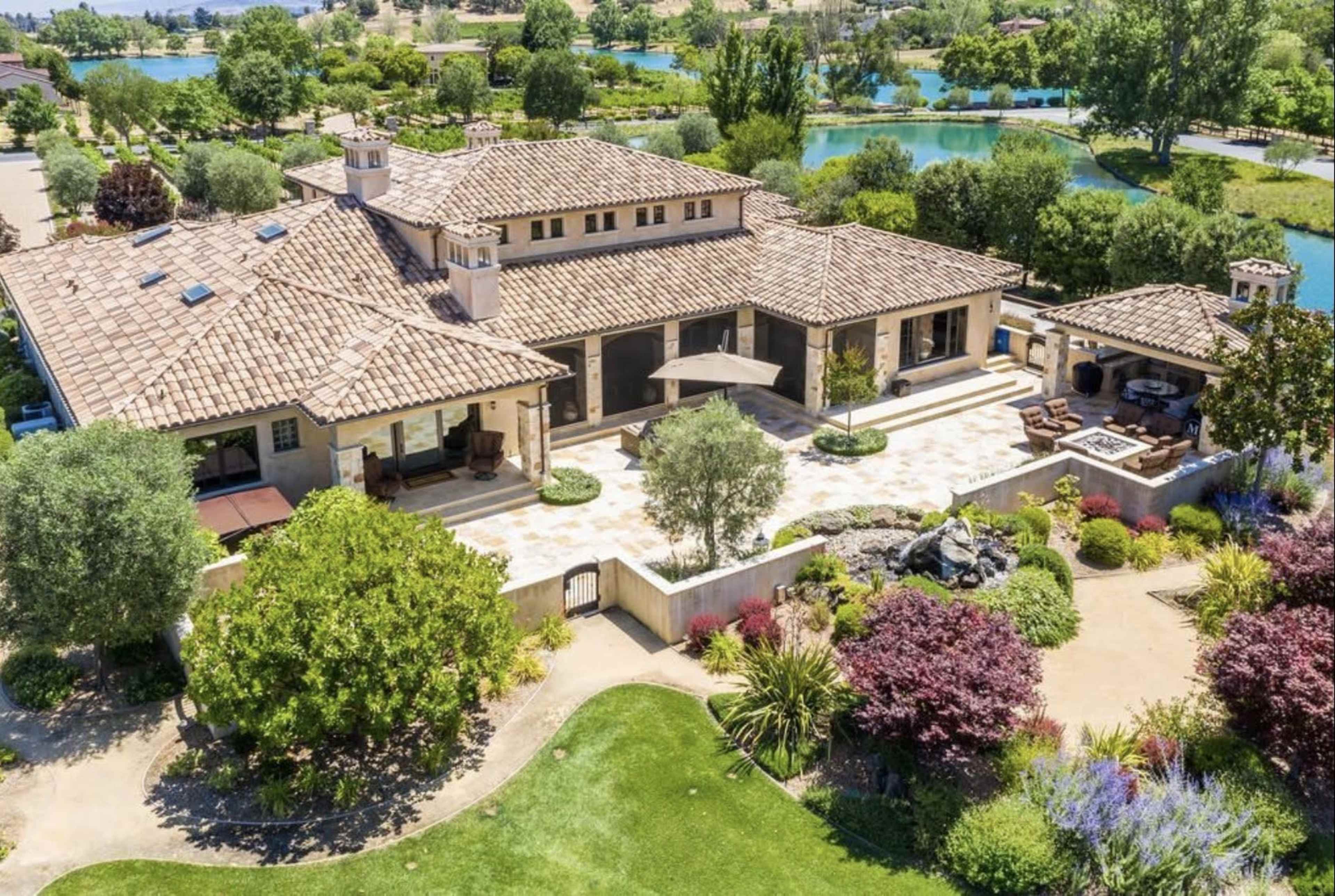 Large Tuscany outdoor with patio overlooking vineyards, mountains and lakes. Image in San Martin, San Martin, CA