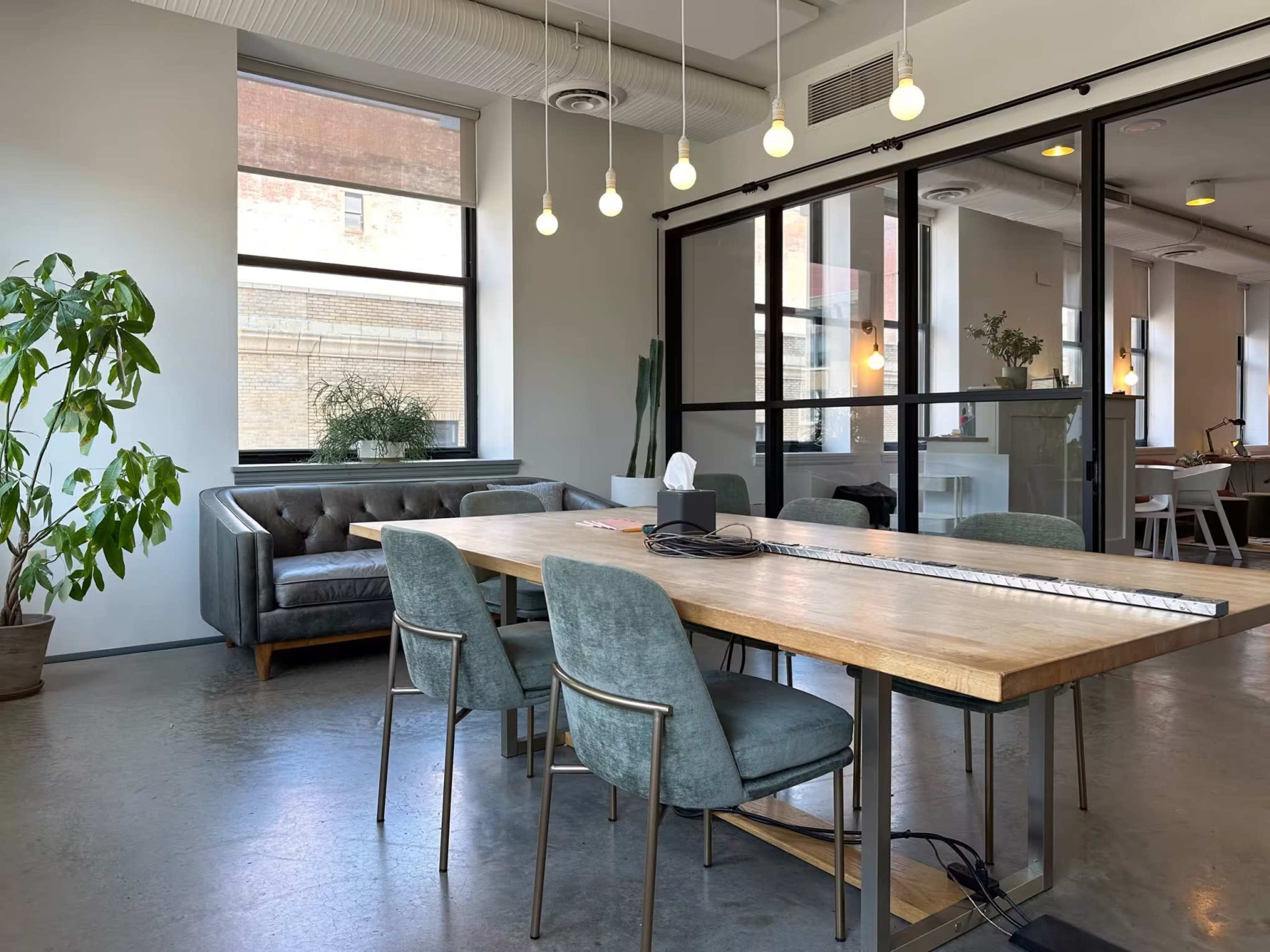 Bright, Beautiful Meeting Room with Huge Windows, Glassboard, and TV for Screen Mirroring Image in East Liberty, Pittsburgh, PA
