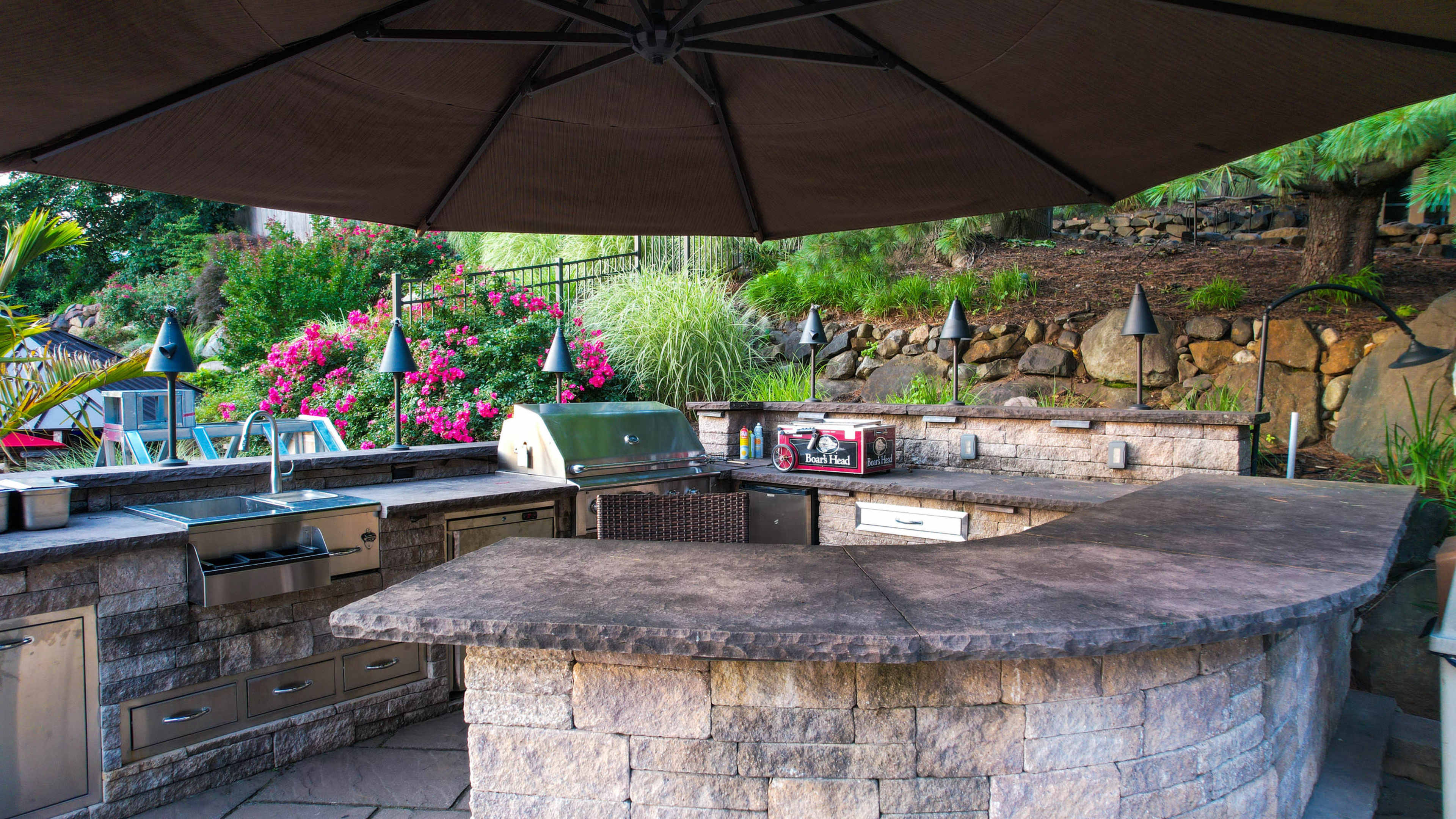 Luxury Resort-Style Backyard Oasis with Pool, Spa, Fire features, Koi pond, Outdoor Dining & entertaining Image in Pompton Plains, Wayne, NJ