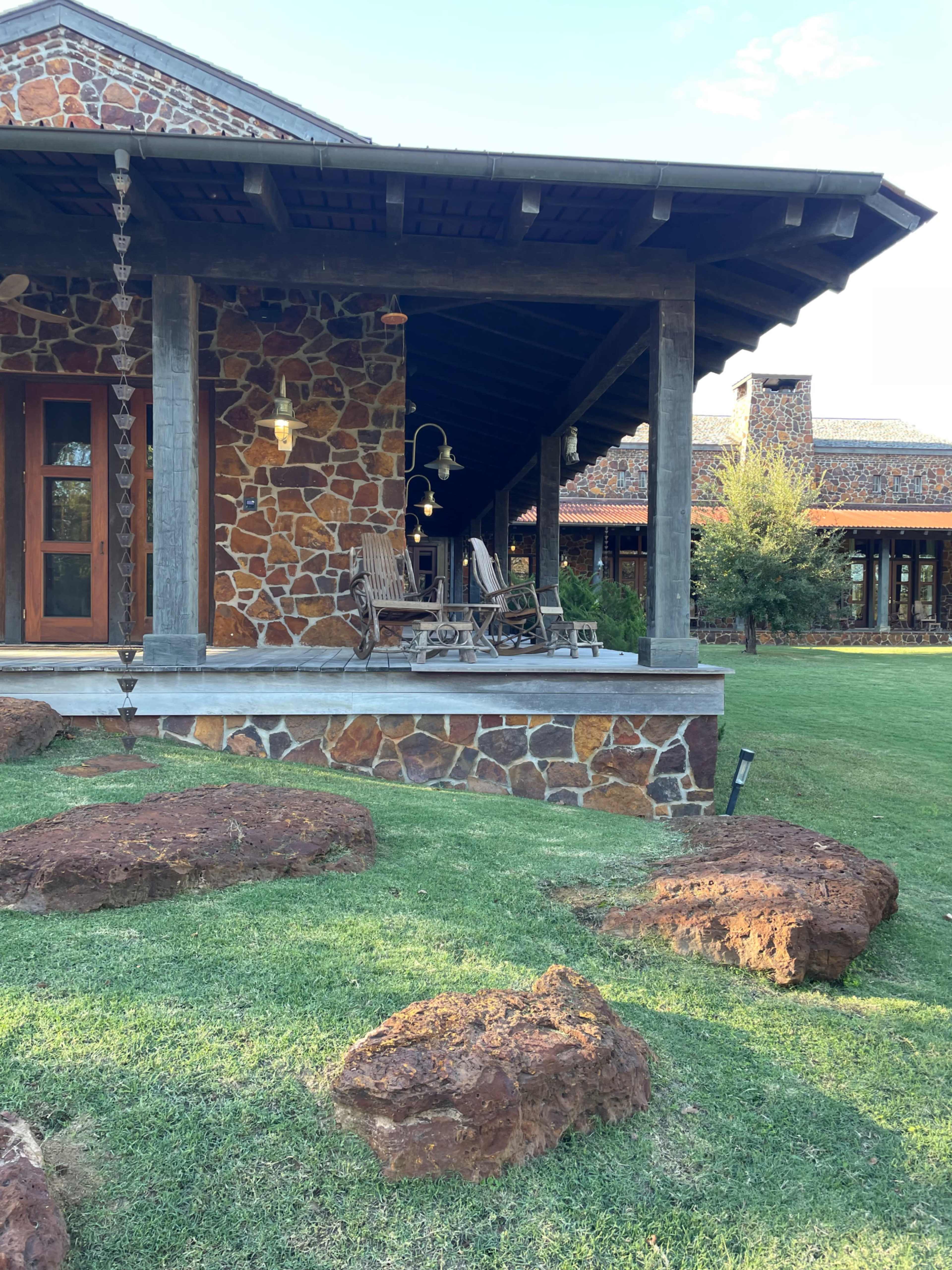 Luxury Cattle Ranch / Farm with Stone Lodge, Log Cabins and Lake. Image in Marquez, Marquez, TX