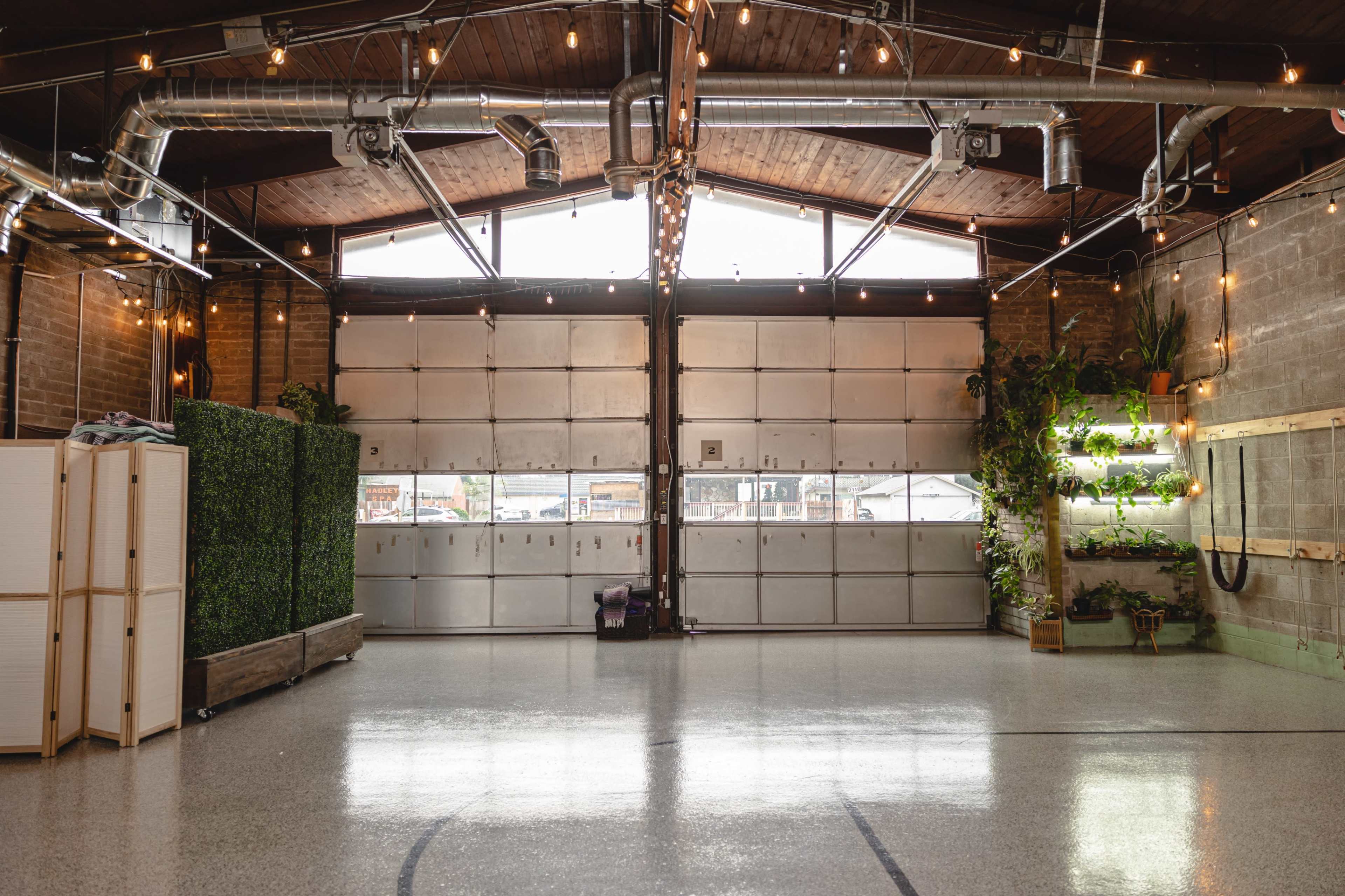 Host your next gathering in a historic firehouse with a stylish, open layout. Image in Mulford Gardens, San Leandro, CA