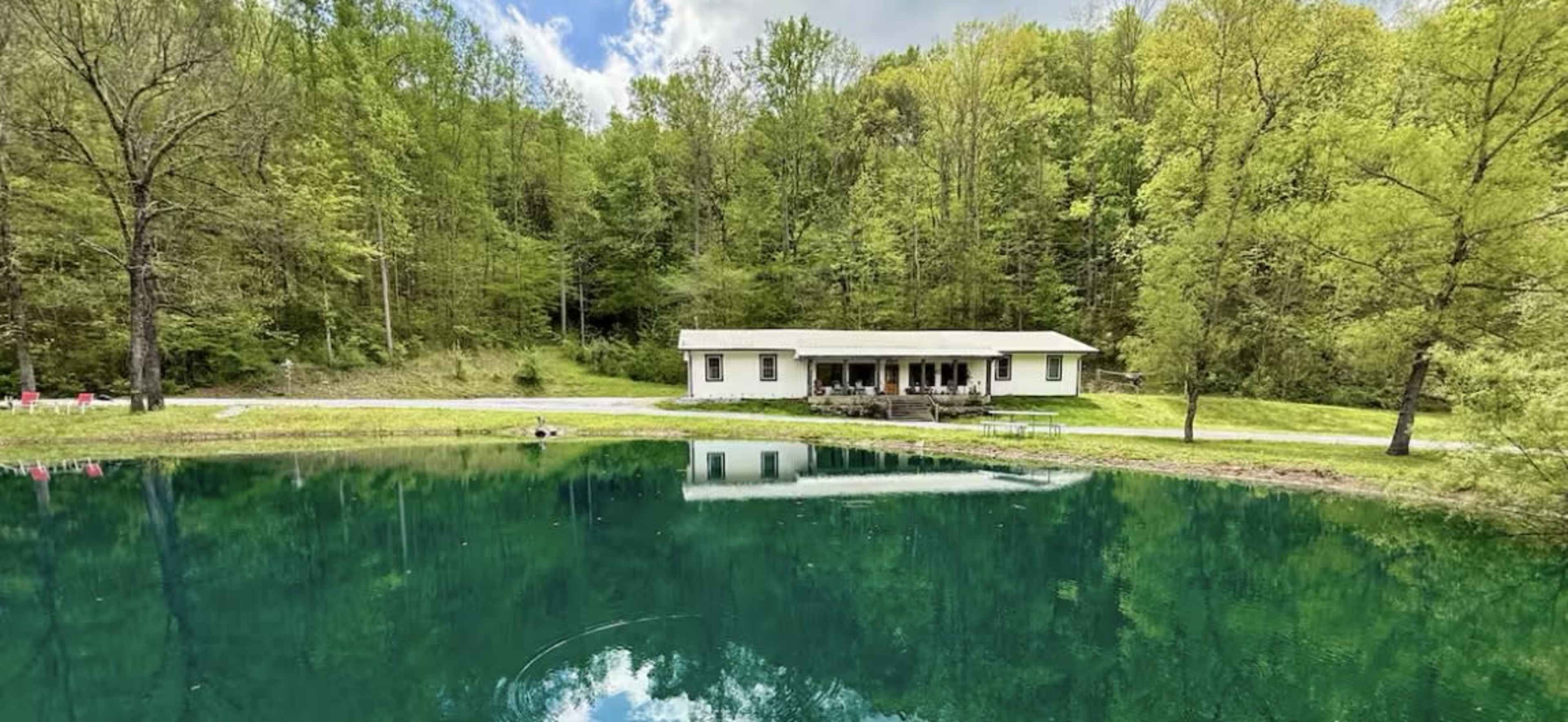 Countryside Waterfront Cabin 55 Acres Mountain View with 1 acre springwater swimming pond Image in , Columbia, TN