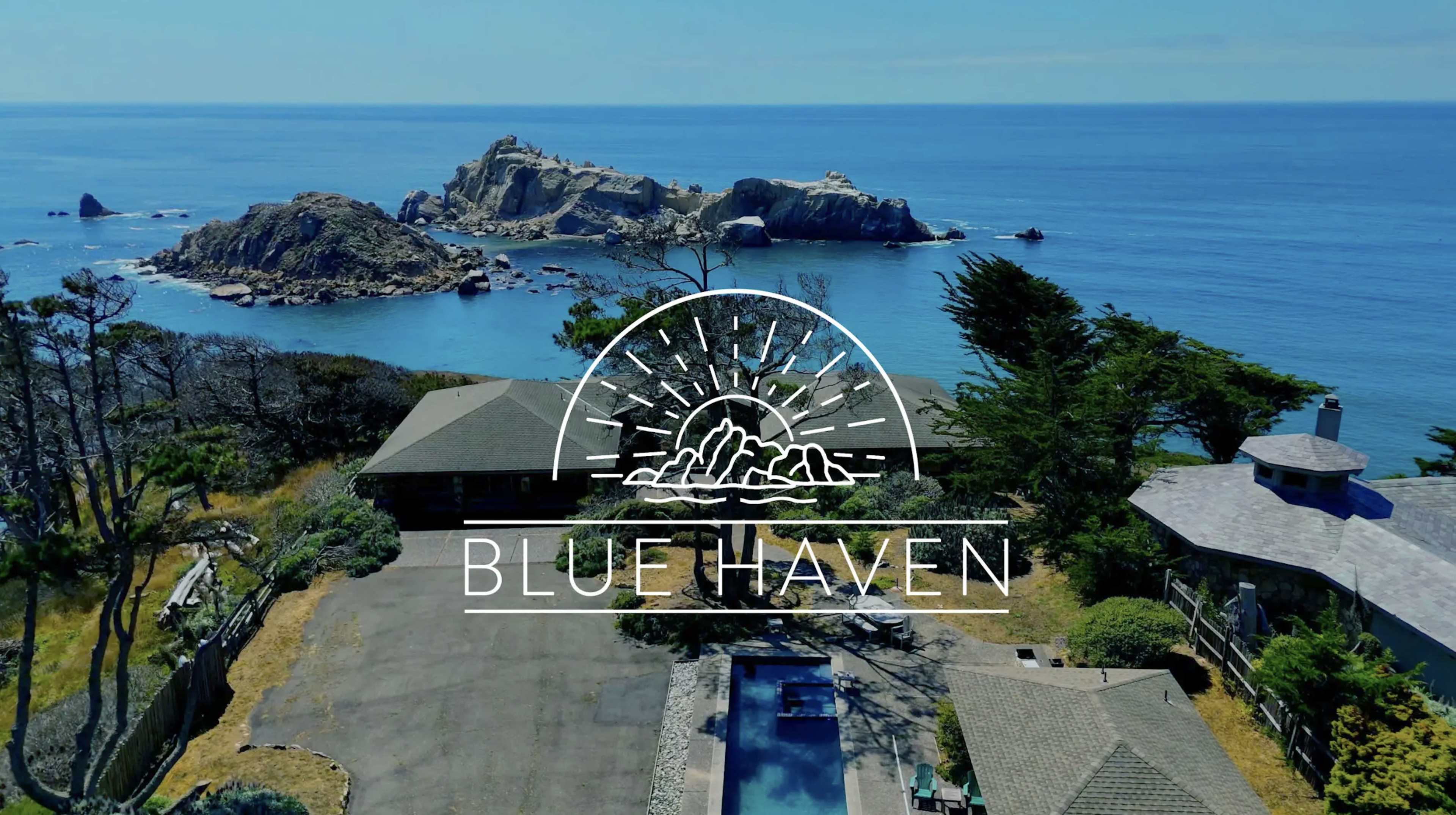 The image shows a coastal property with a pool and a view of rocky islands in the ocean.