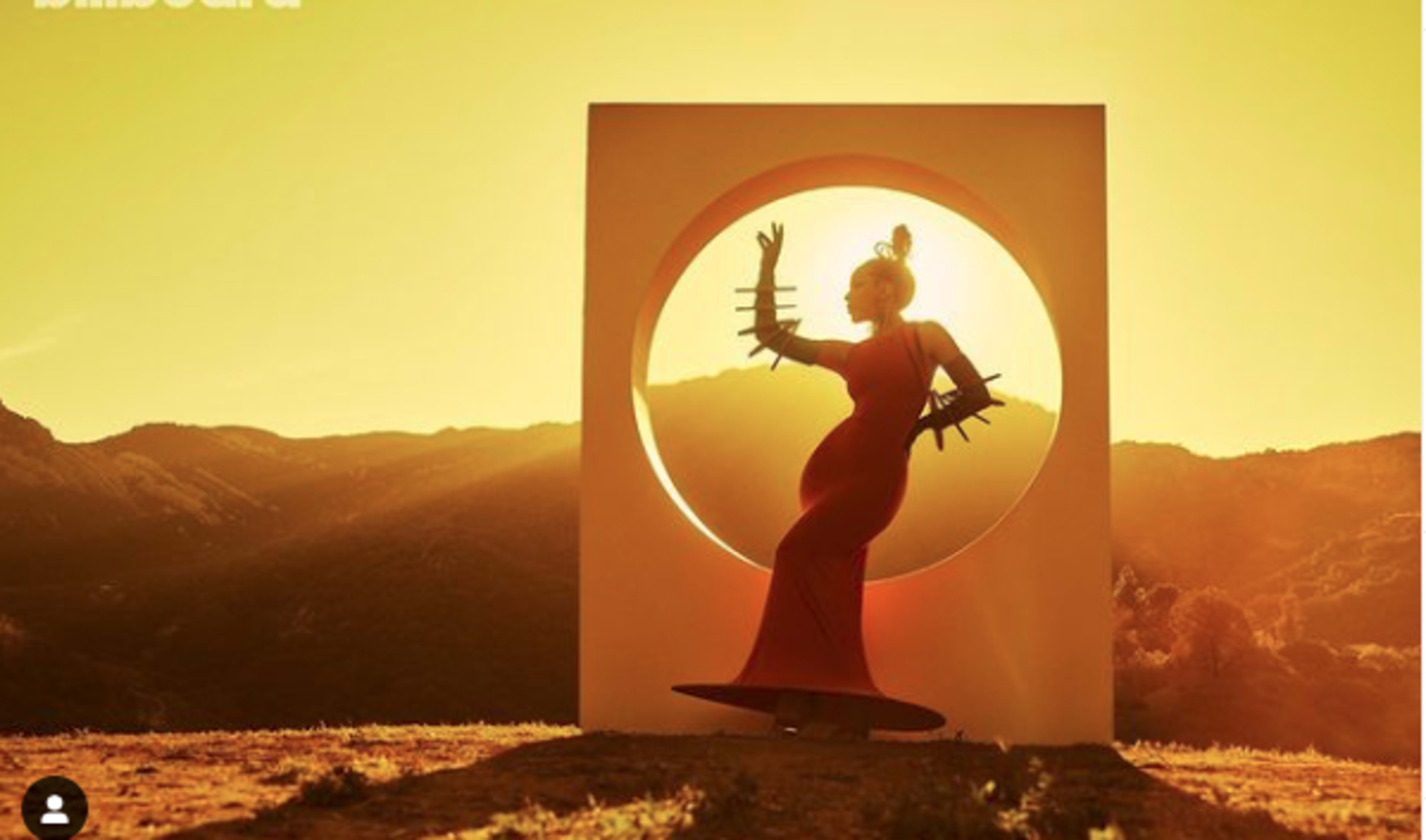 A silhouetted figure in a dramatic dress poses within a circular frame against a sunset landscape.