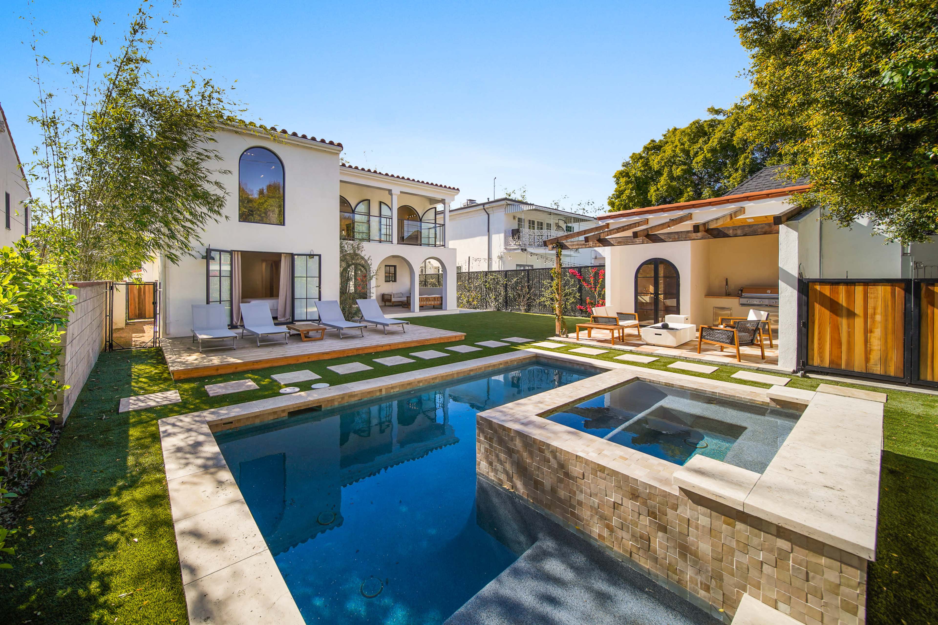 MODERN SPANISH VILLA WITH ARCHES, BEAMS & POOL Image in Central LA, Los Angeles, CA