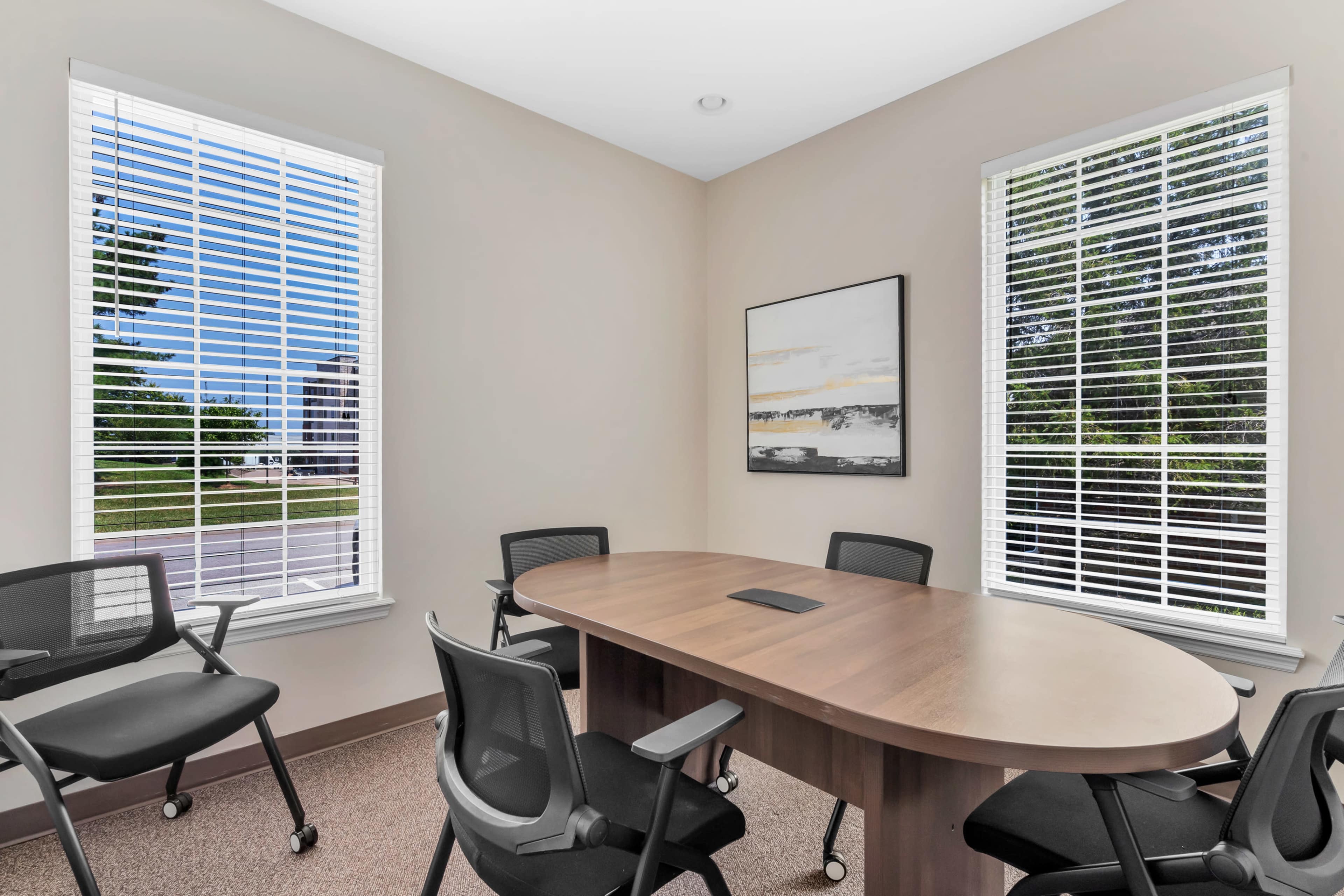 Small boardroom-style conference room in St. Peters, MO. Image in O'Fallon Township, St. Peters, MO