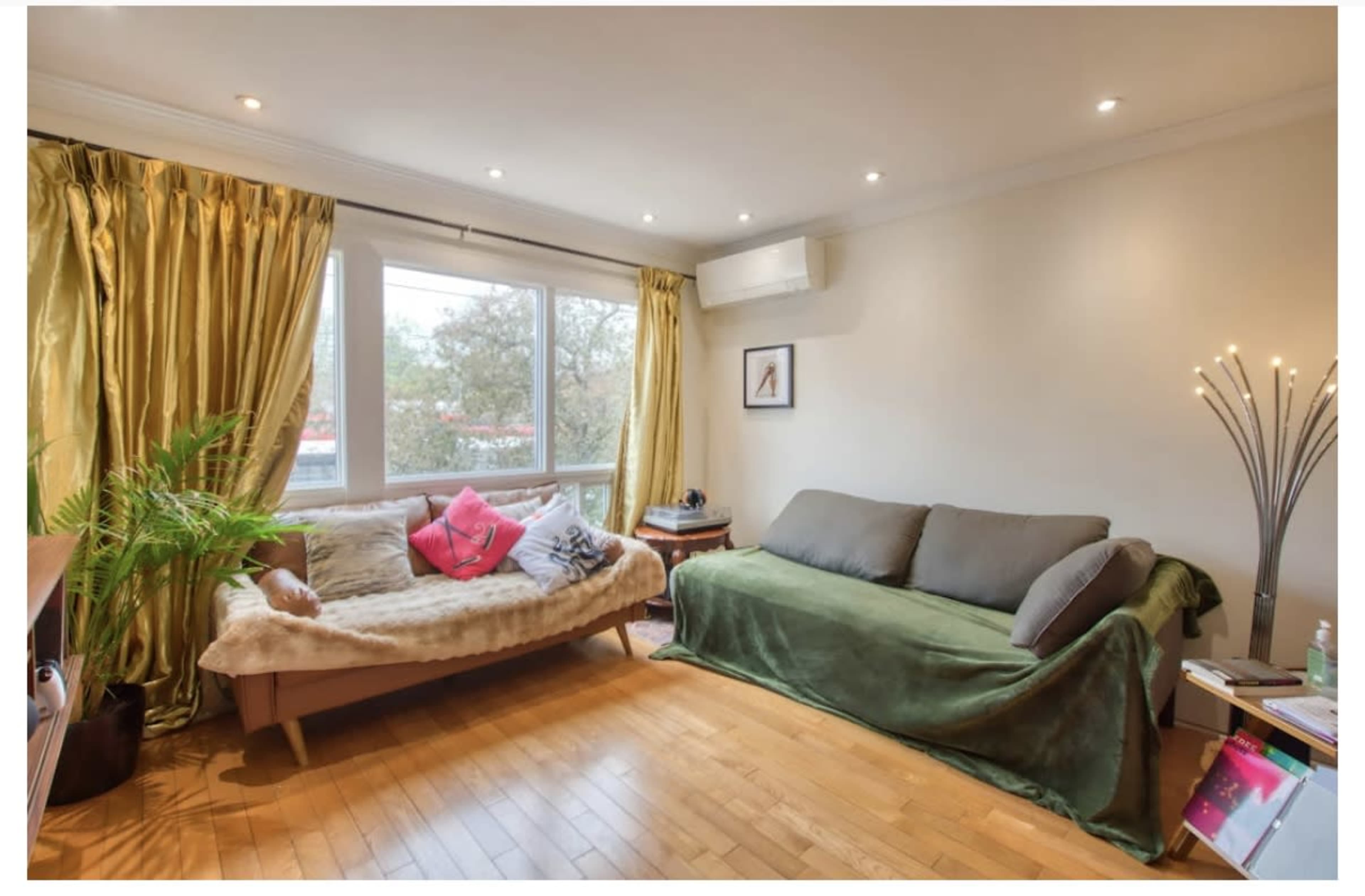 Riverside Townhouse with a beautiful, naturally lit living room Image in South Riverdale, Toronto, ON