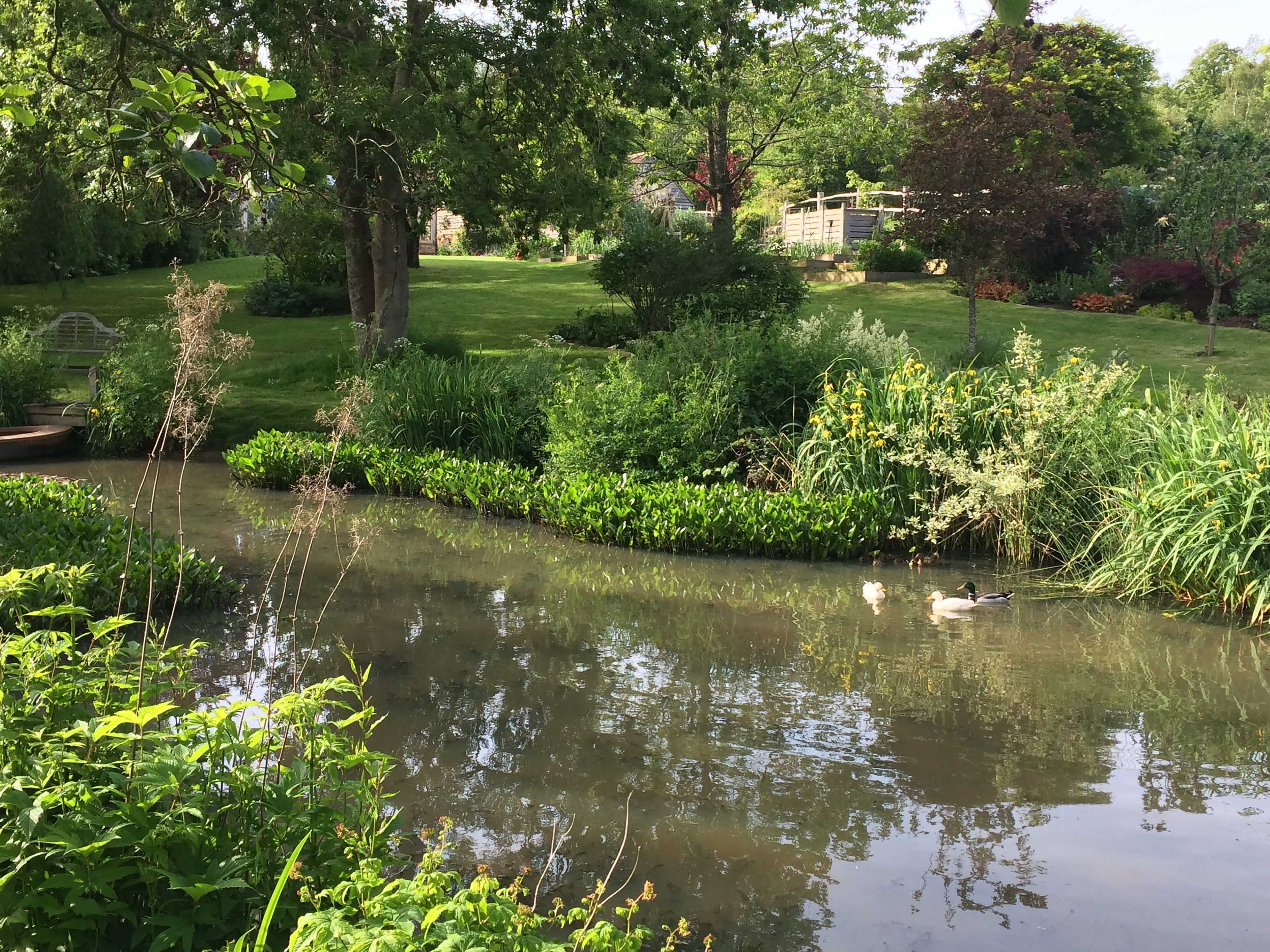 English Country Gardens with 17th century timber framed Sussex farmhouse. Image in Barcombe, Barcombe, ENG