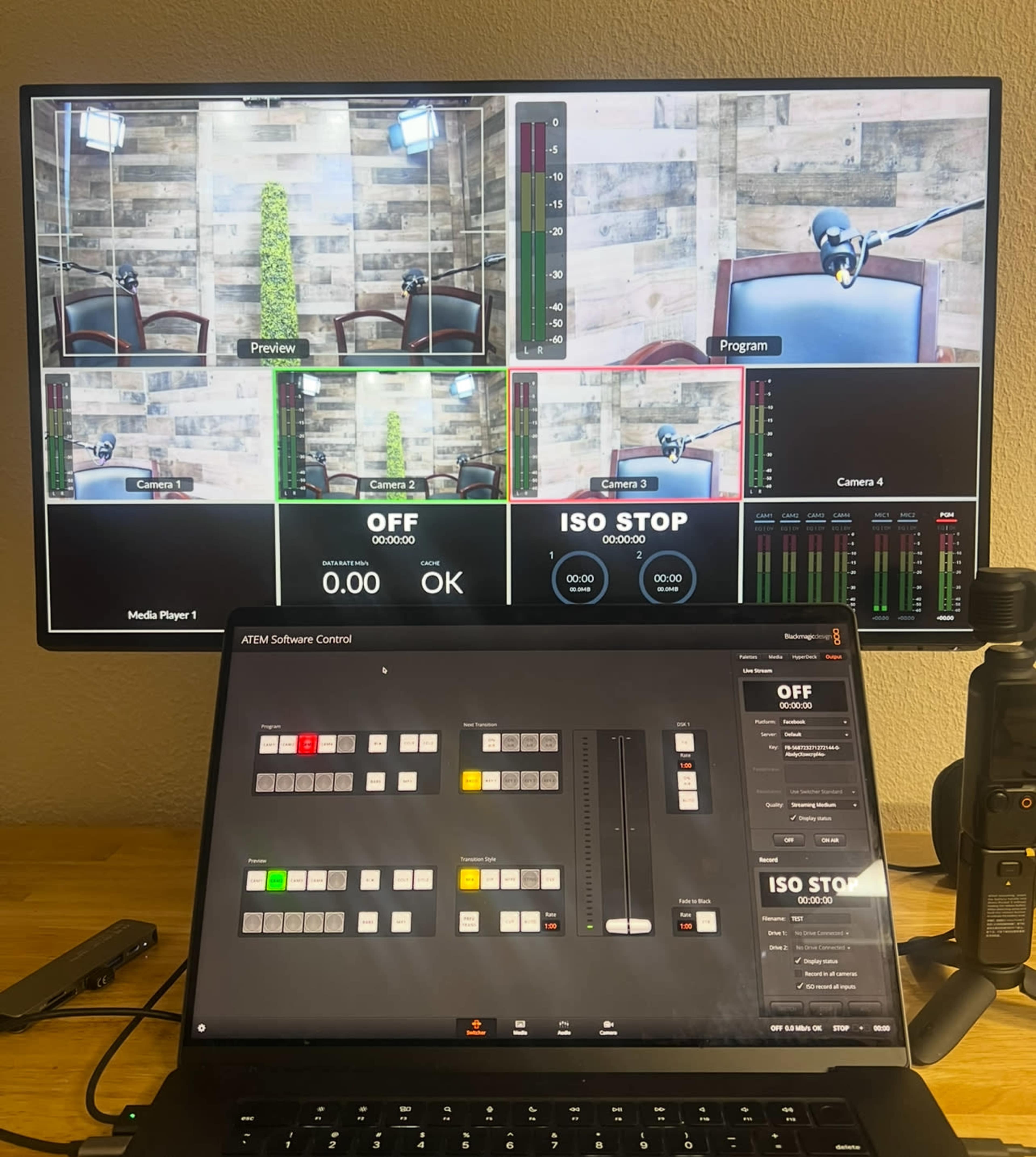 The image shows a multi-screen setup displaying video feeds and controls for a live streaming or broadcasting session.