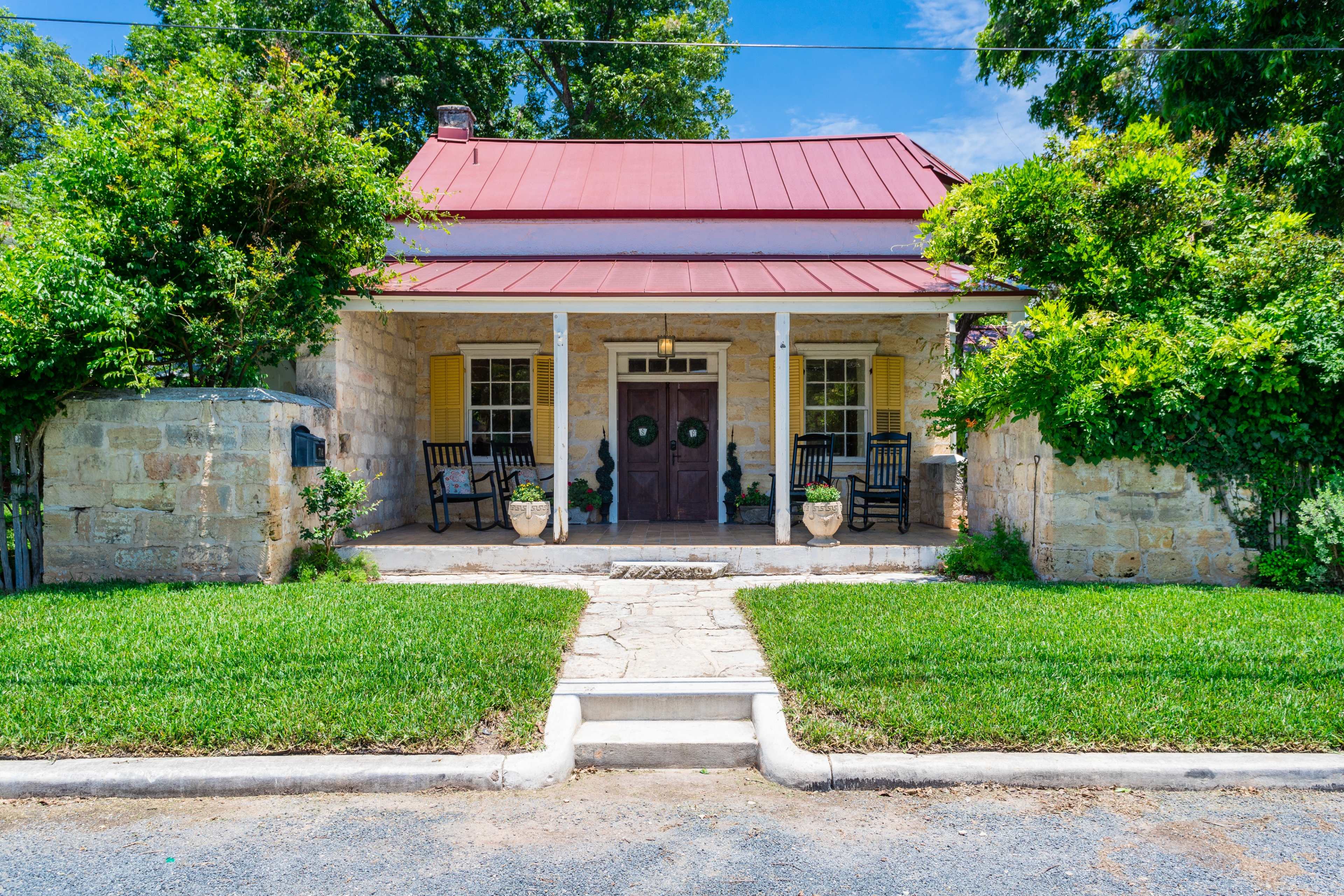 Historic Rock Estate Home and cottage with pool and barn on 2/3 acres Image in , Fredericksburg, TX