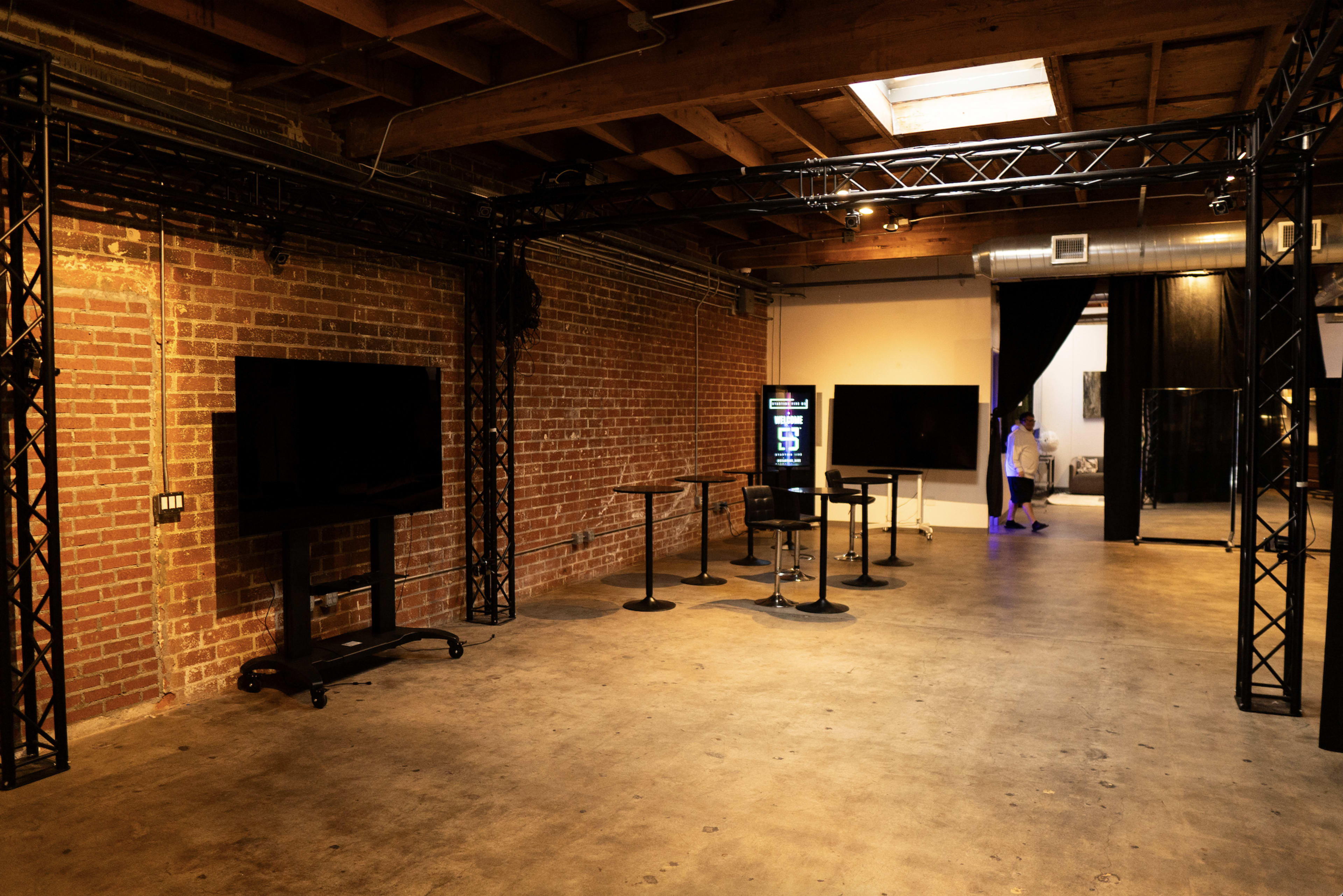 Unique & Spacious Flex Space with Stage | Sound System | Multiple Rooms | Red Carpet | Podcast Studio Image in Mid-City, Santa Monica, CA