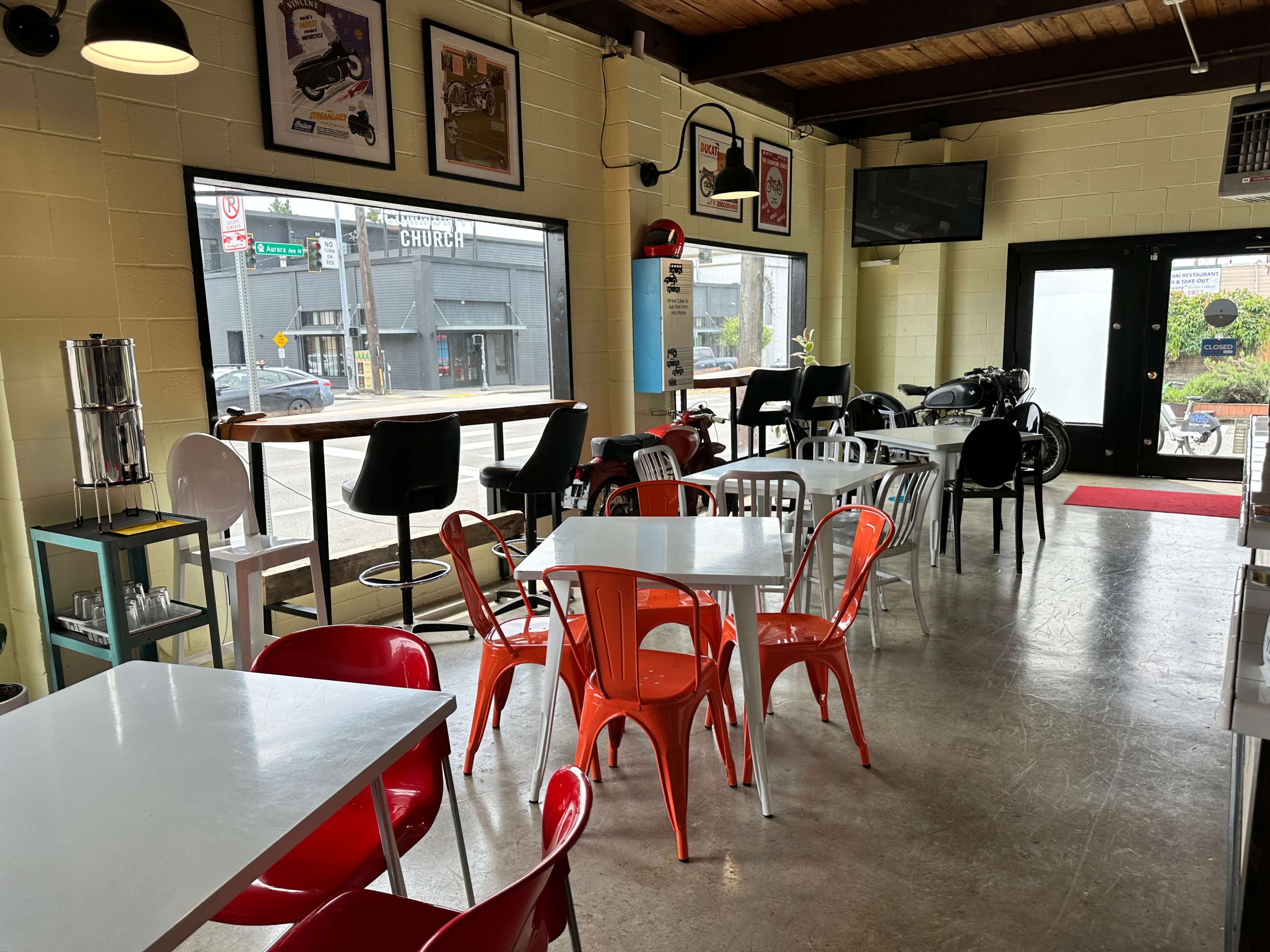 Cafe and Tavern in historic motorcycle service center. Image in Greenwood, Seattle, WA