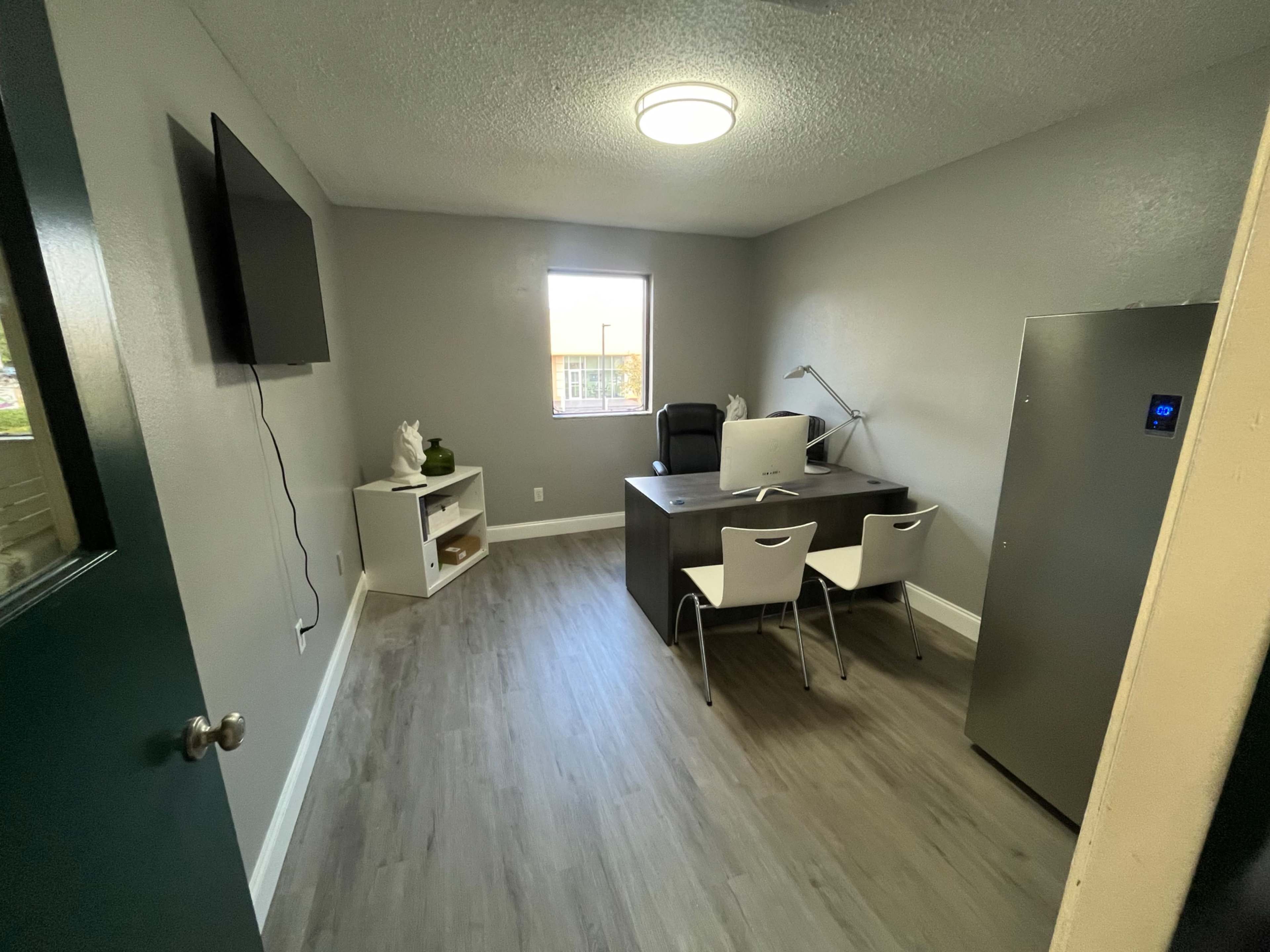 Modern office space with refrigerator/freezer Printer and couch Image in Temple Terrace, Temple Terrace, FL