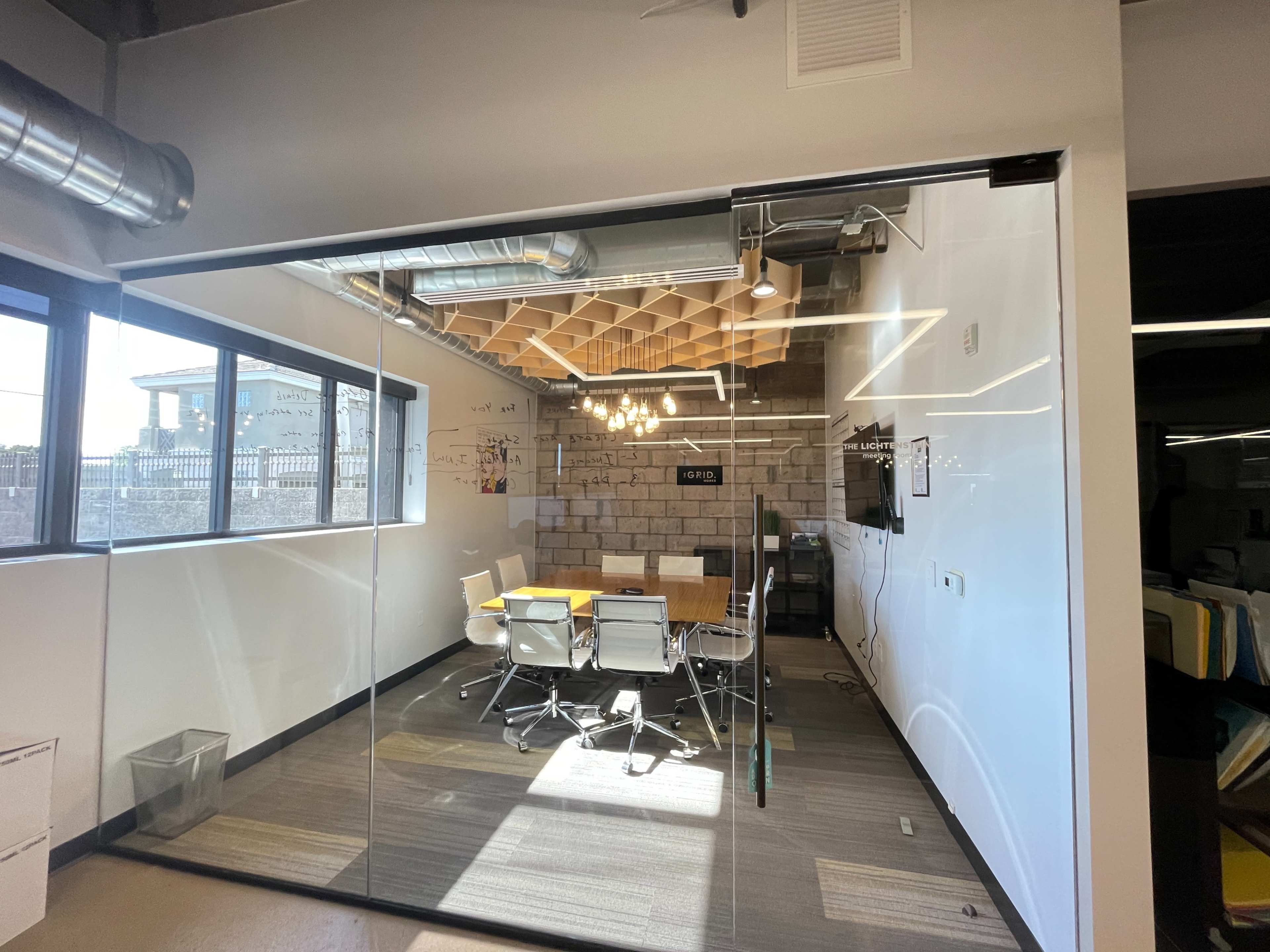 A Warm Industrial Modern Conference Room (great lighting/smart TV) WIFI Image in Camelback East Village, Phoenix, AZ