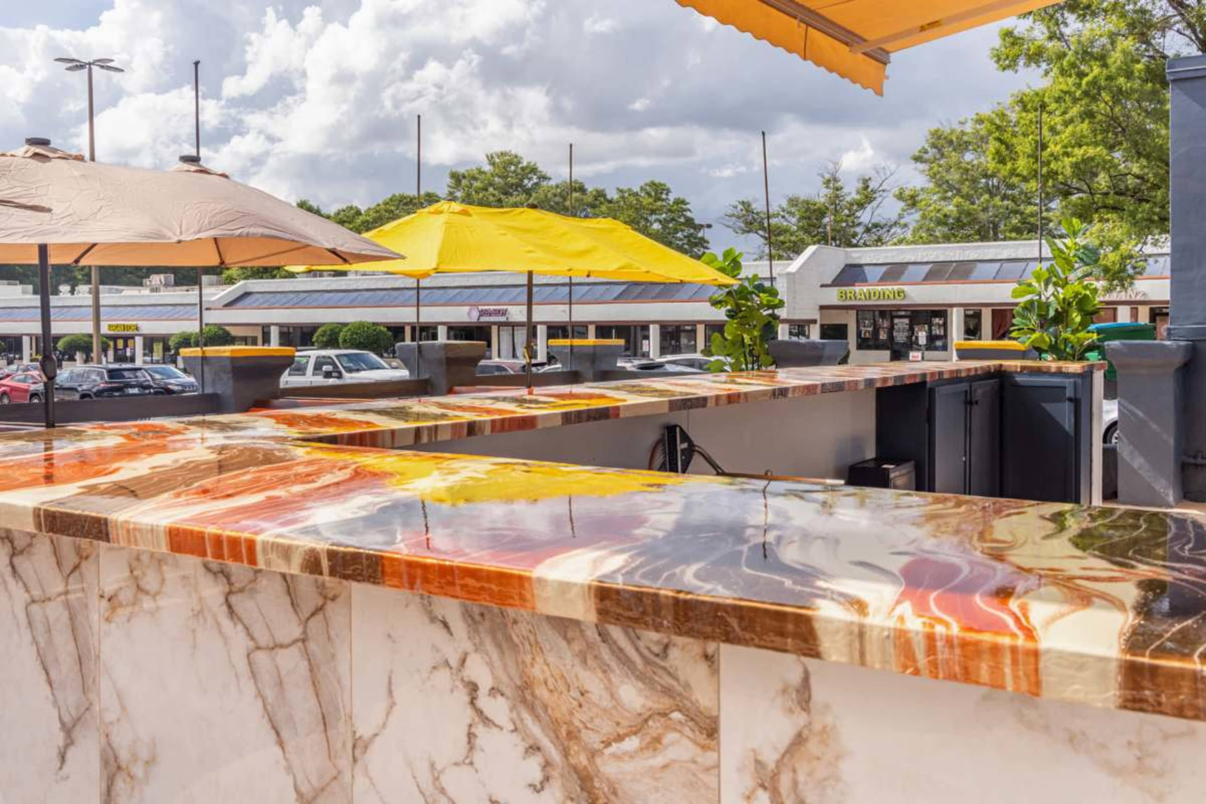 Full Outside Patio of Traditions Global Cuisine Image in Morrow, Morrow, GA