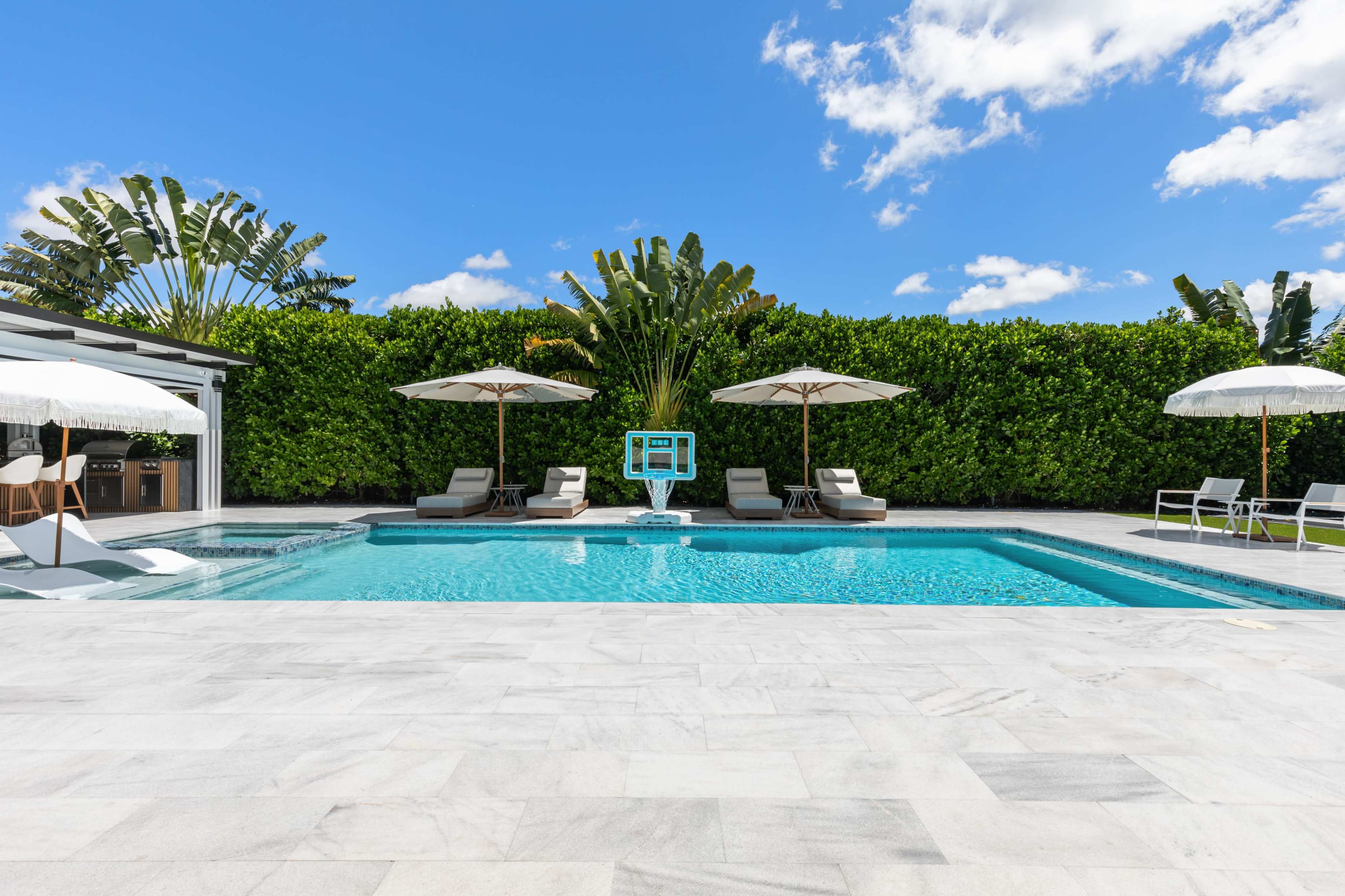 Multi Set Luxe Modern Home with Resort-Style Backyard + Designer Interior Image in , Miami, FL
