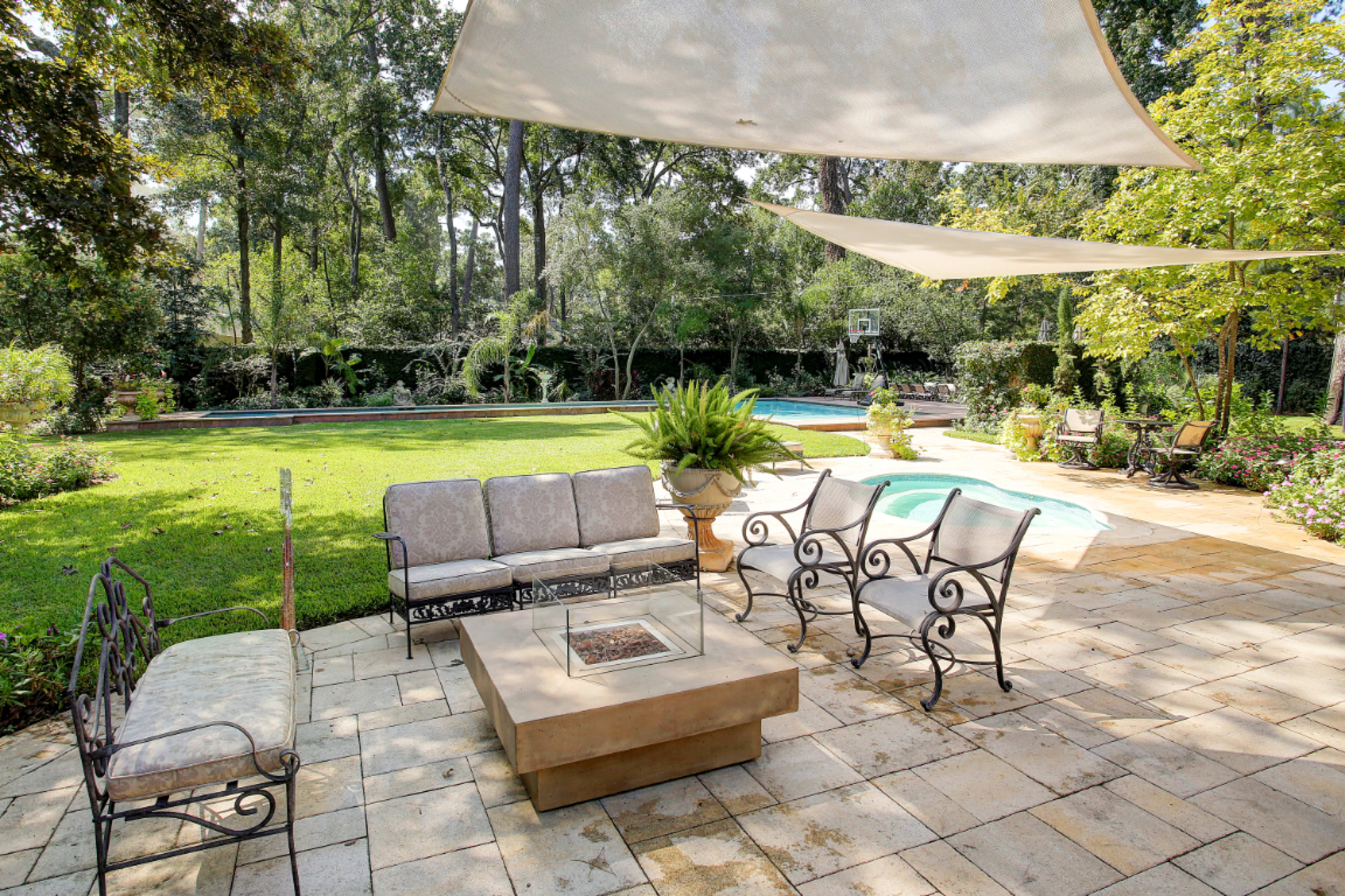 Private Luxury Home with Large Yard and Pool Oasis Image in Greater Uptown, Houston, KS