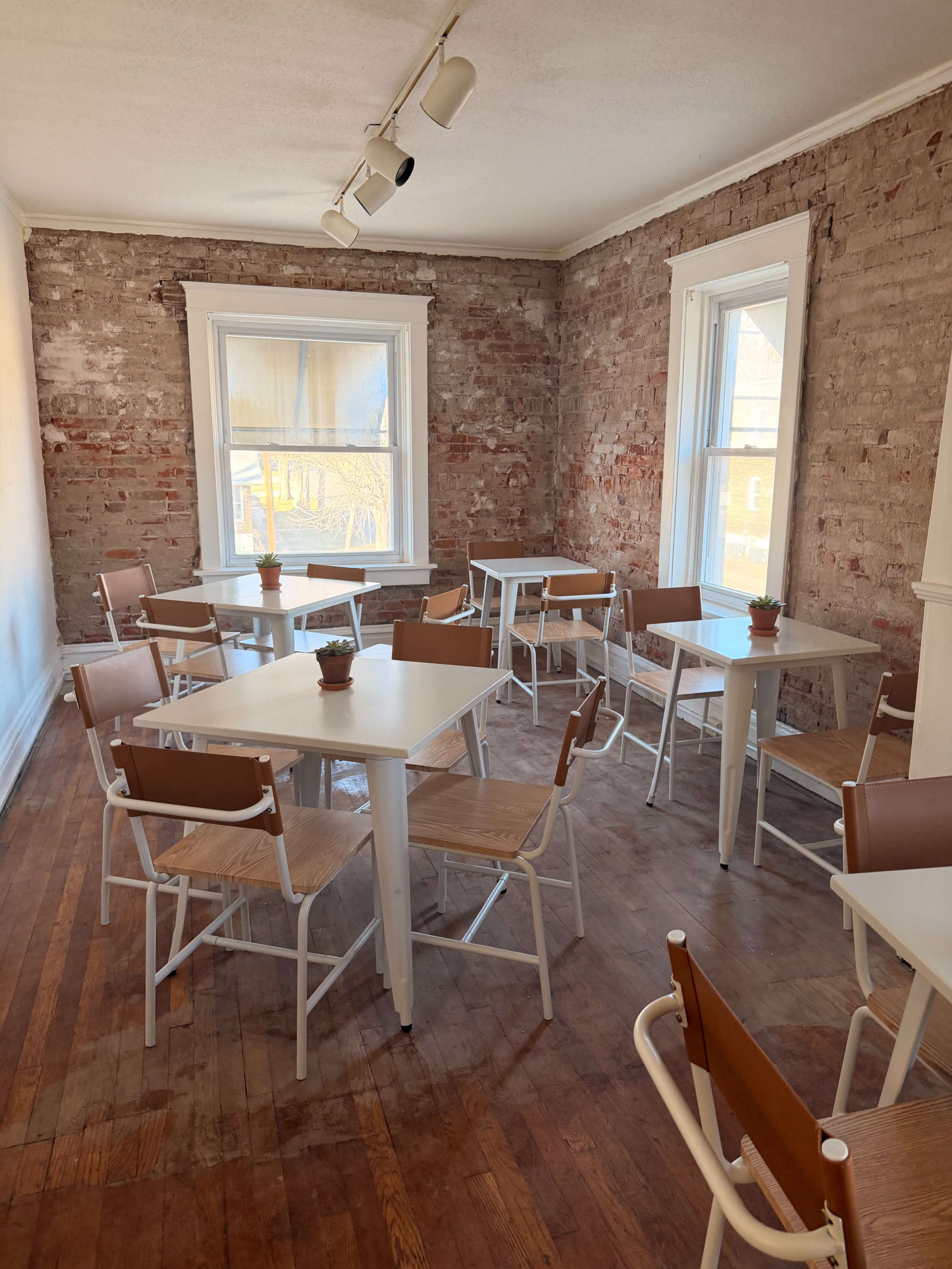 Cozy Upstairs Meeting Space with Lunch Options Downstairs Image in Hadley Township, Maplewood, MO