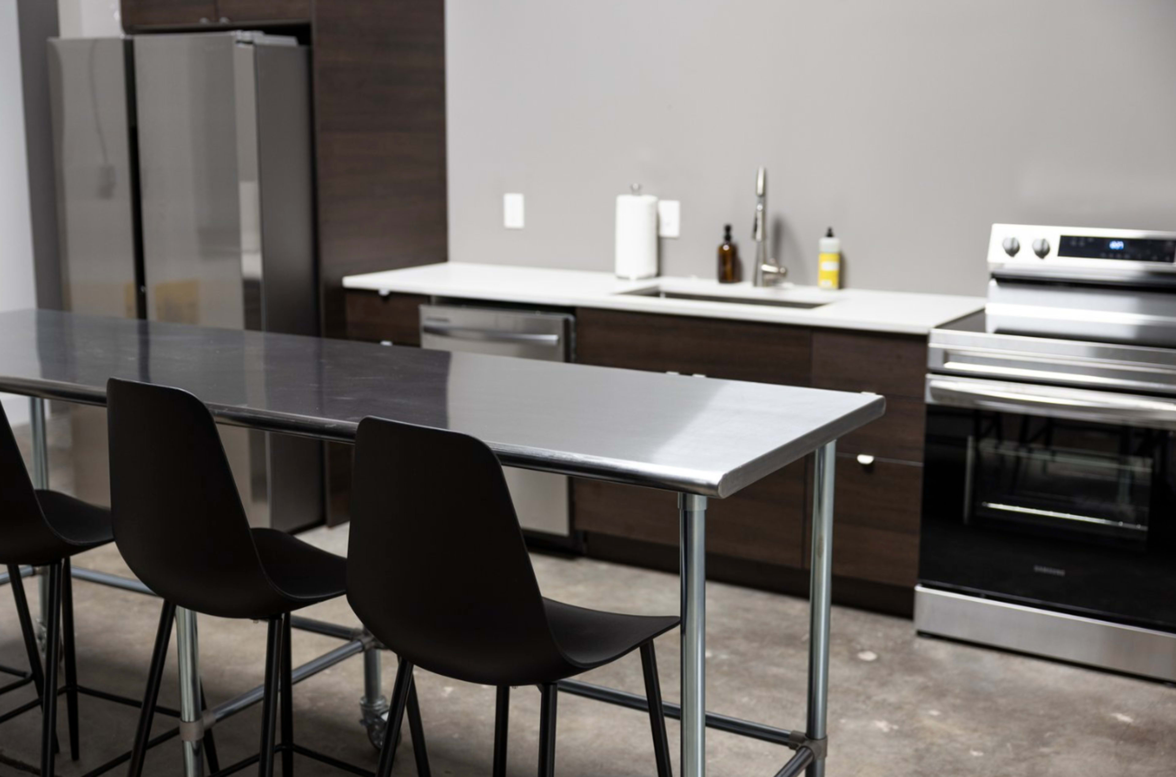 Mid Century Modern Event Space for micro weddings, film screenings, product launches, book clubs, conferences, workshops, offsites, meetings, etc. Image in Adair Park, Atlanta, GA
