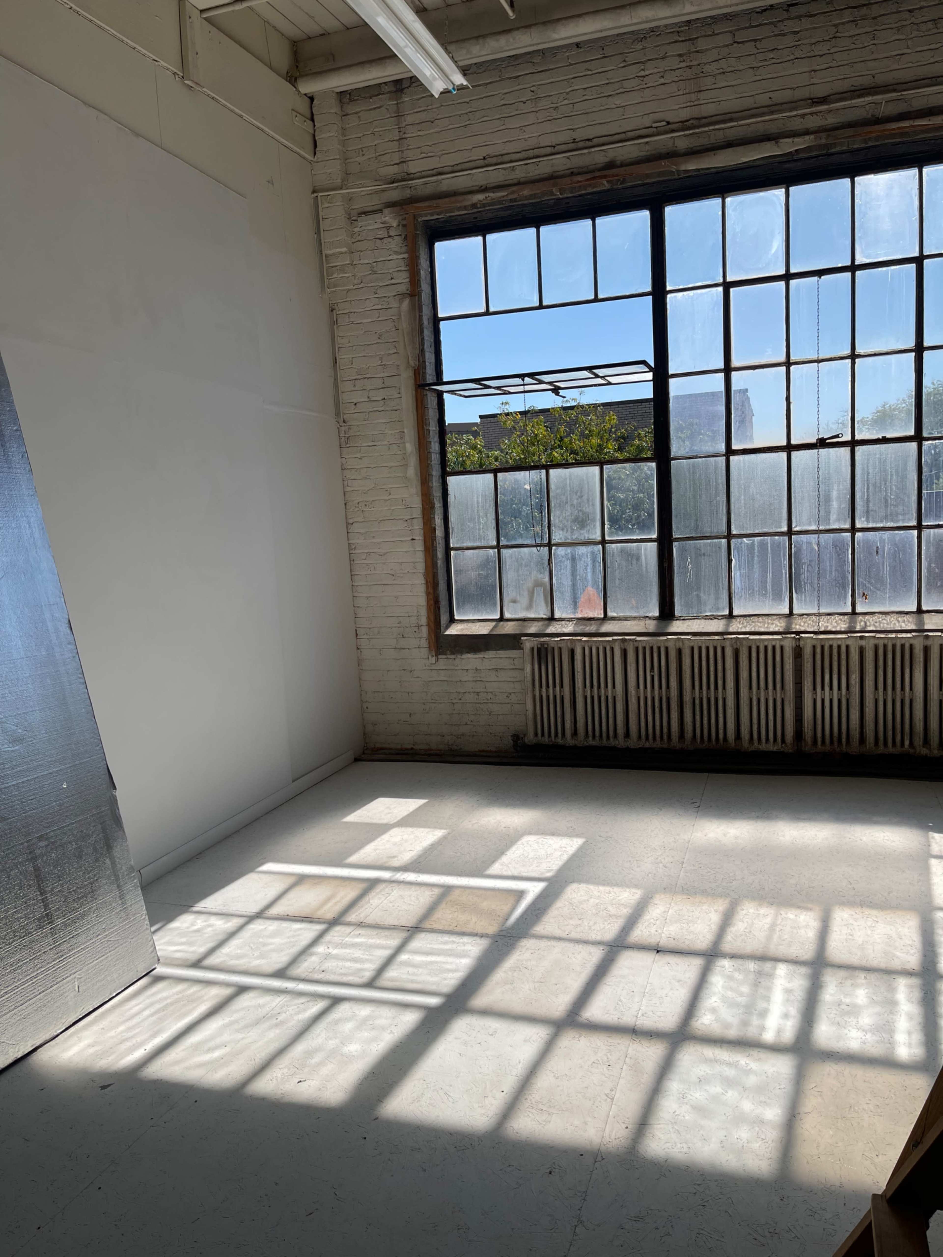 Bright Photo Studio with Olipant Backdrops, Vflats, and Apple Boxes Image in Humboldt Park, Chicago, IL