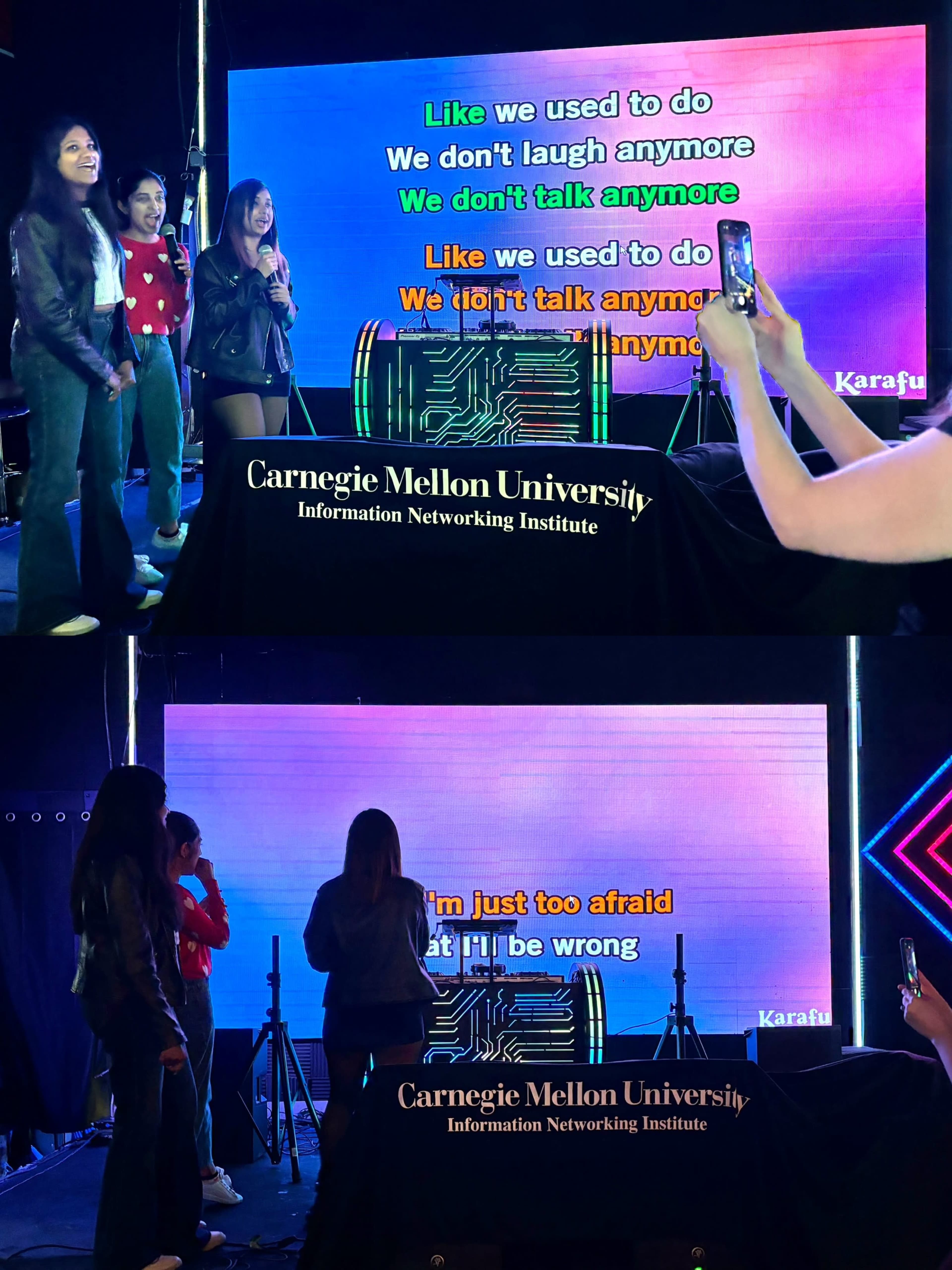 Three individuals are singing karaoke in front of a large screen displaying lyrics at Carnegie Mellon University.