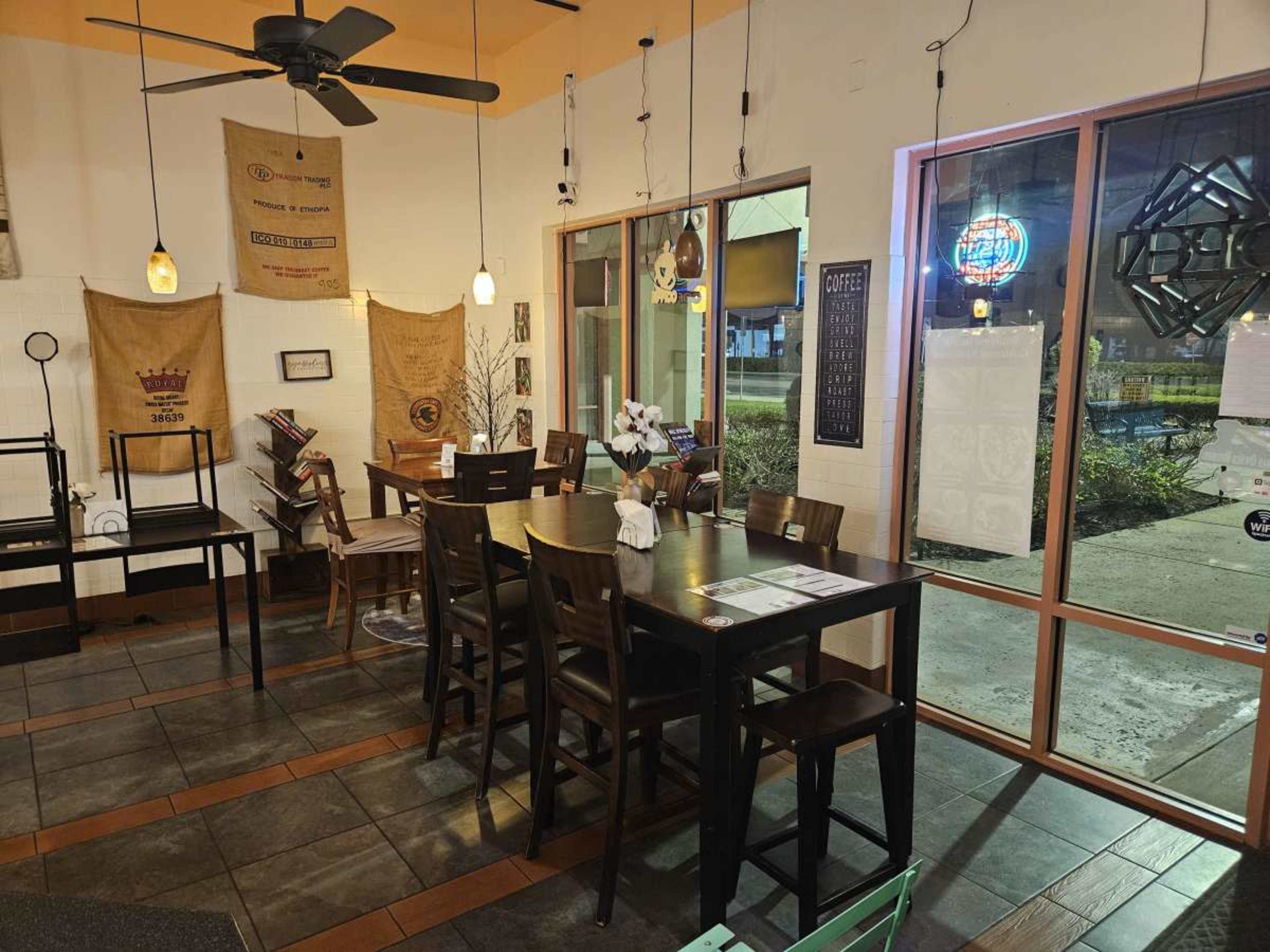 Charming Café Gathering Space with Warm and Inviting Interior Image in Town Of Blake, South Daytona, FL